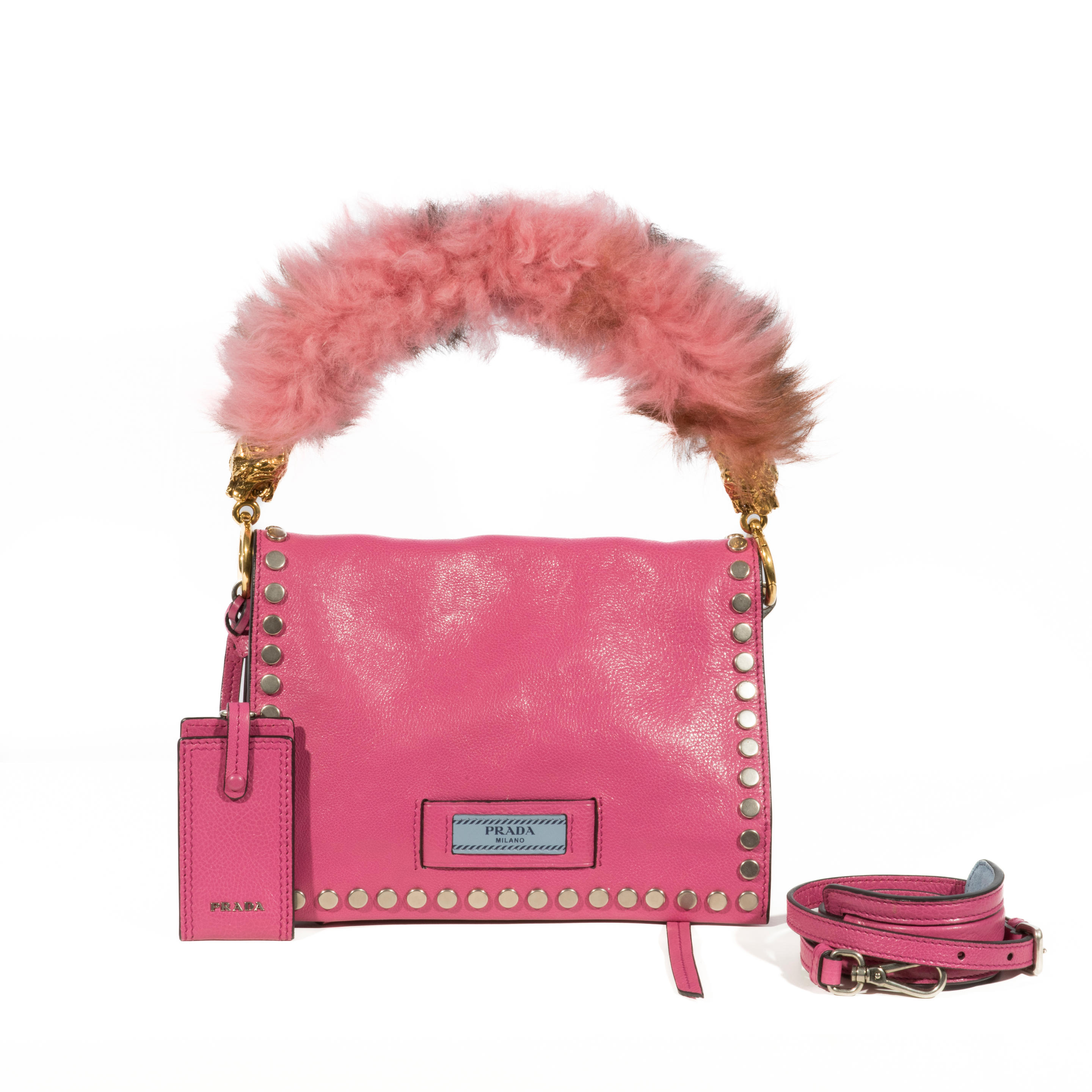 Appraisal: PRADA SAC ETIQUETTE CM En cuir rose partiellement clout poign