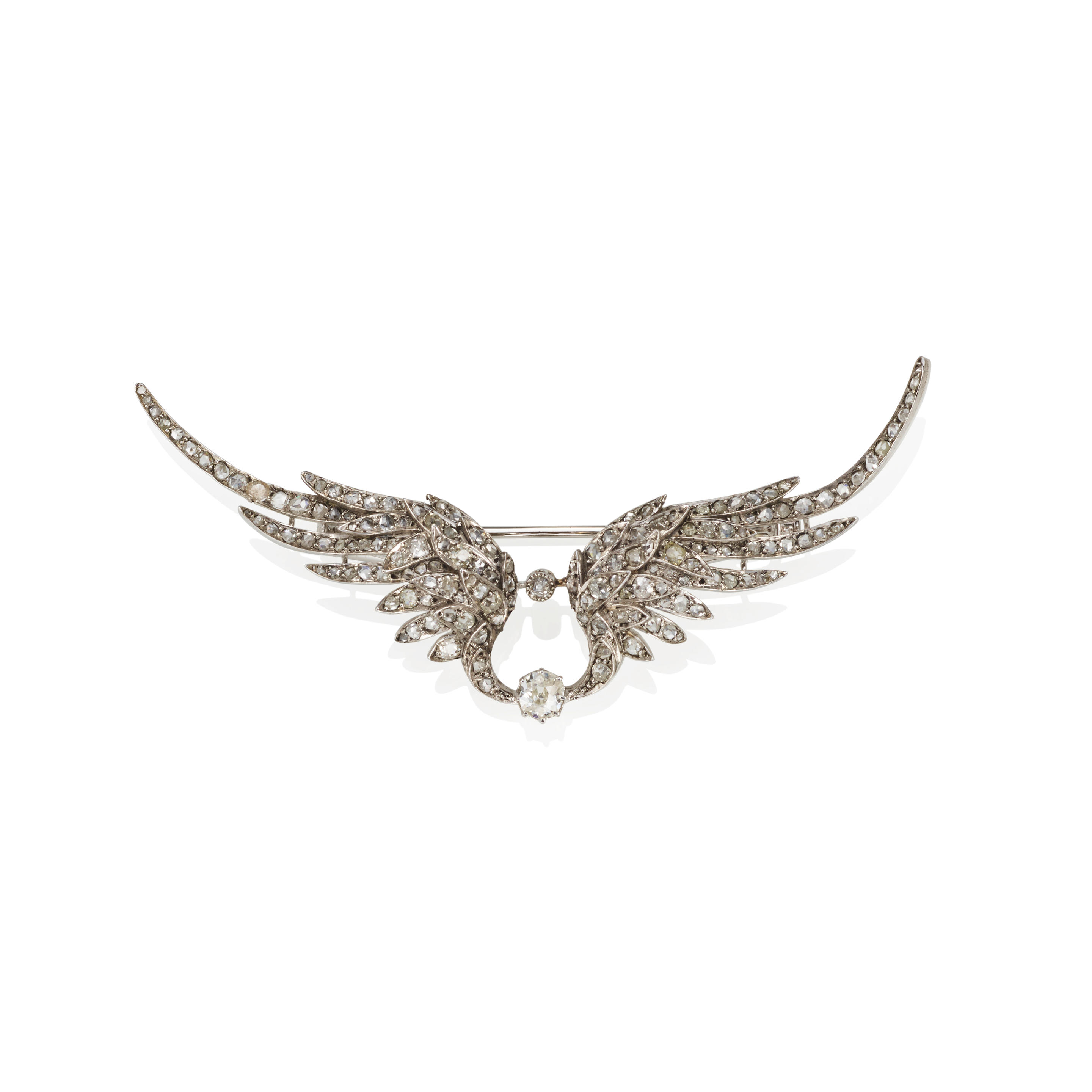 Appraisal: A SILVER-TOPPED GOLD AND DIAMOND WING BROOCH Diamonds estimated gross