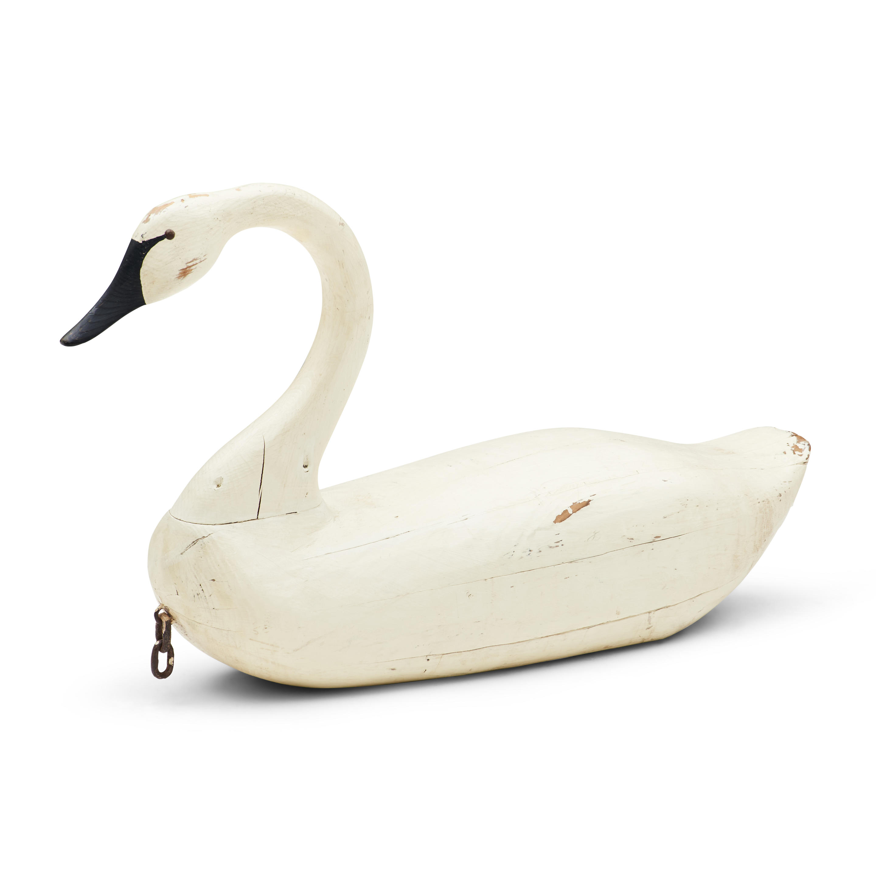 Appraisal: CARVED AND PAINTED WOODEN SWAN America c Life-sized floating decoy