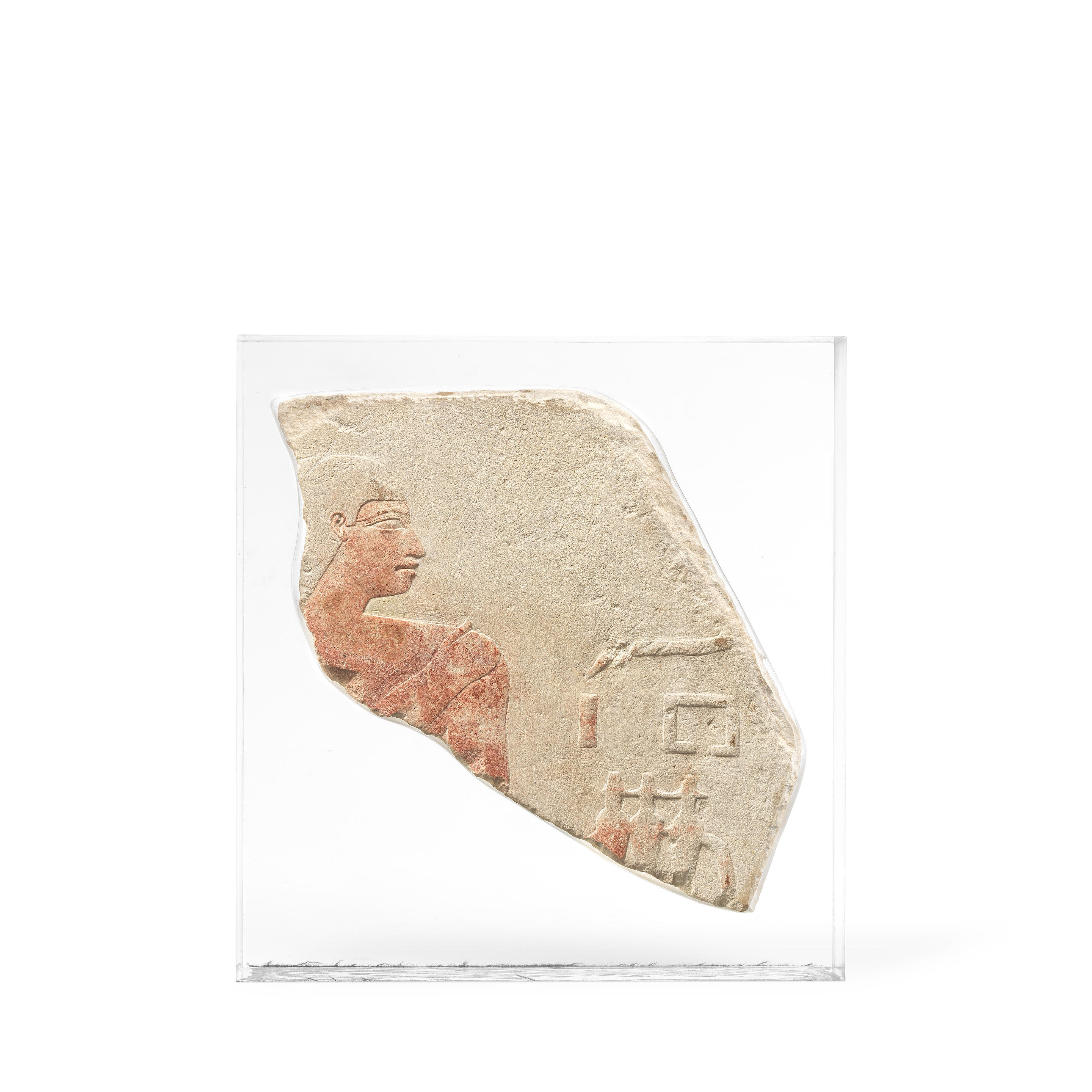 Appraisal: AN EGYPTIAN PAINTED LIMESTONE RELIEF An Egyptian painted limestone relief