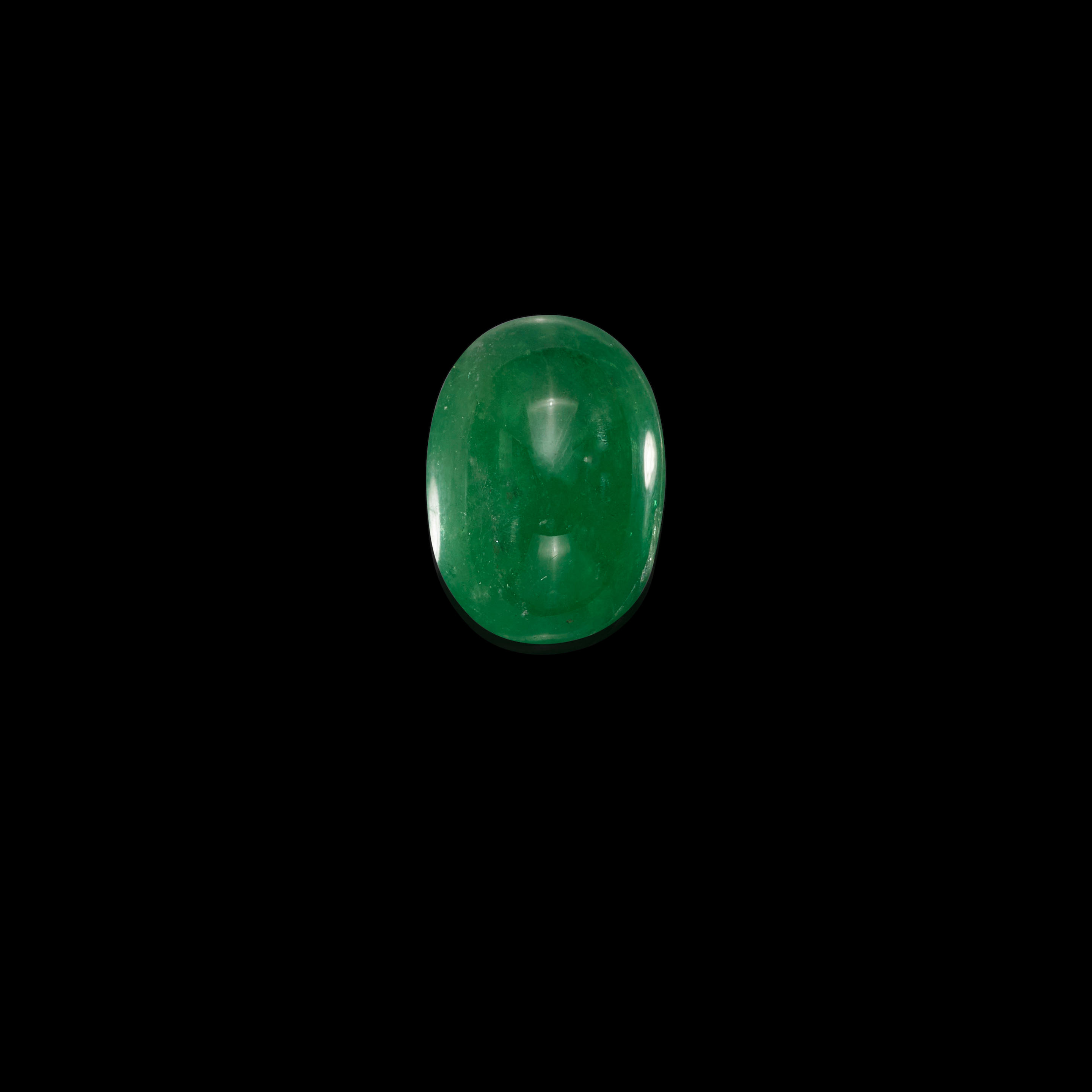 Appraisal: TSAVORITE GARNET CABOCHON Kenya Africa An oval tsavorite garnet cabochon