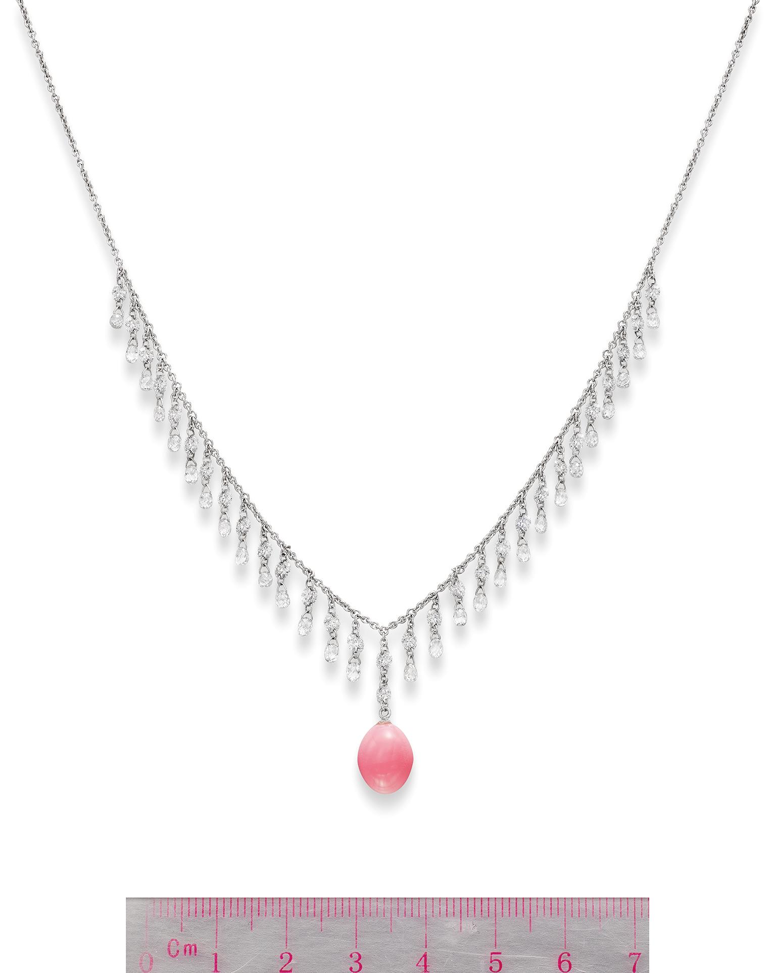 Appraisal: CONCH PEARL AND DIAMOND PENDANT NECKLACE The drop-shaped conch pearl