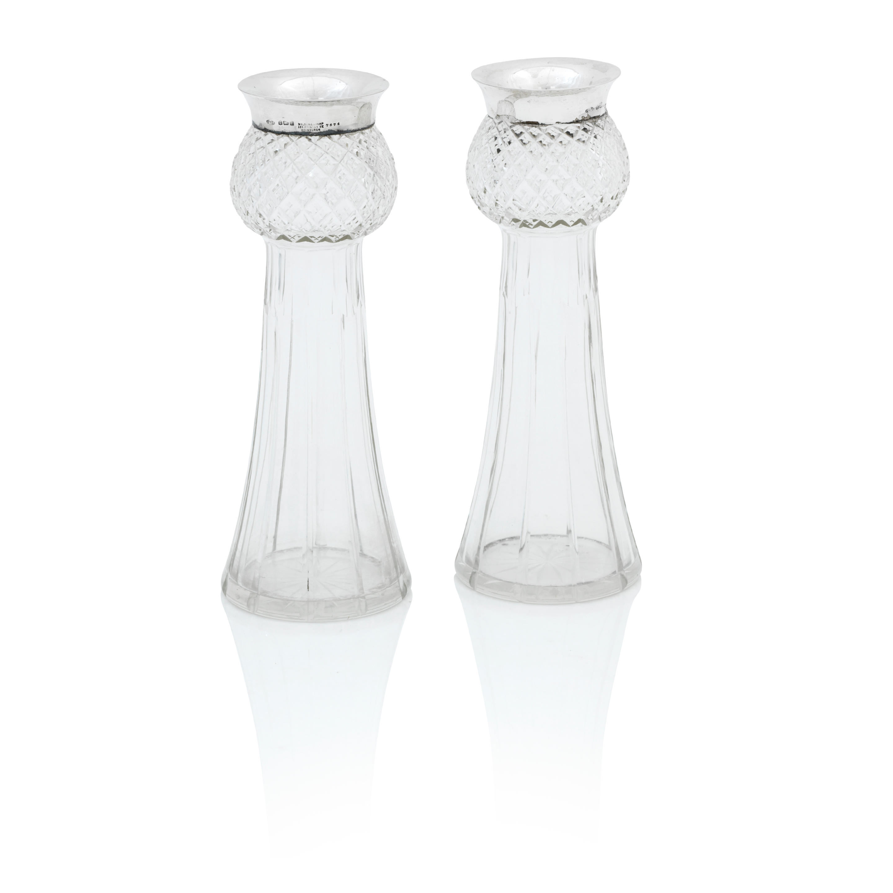 Appraisal: A PAIR OF EDWARDIAN SILVER-MOUNTED THISTLE FORM GLASS VASES the