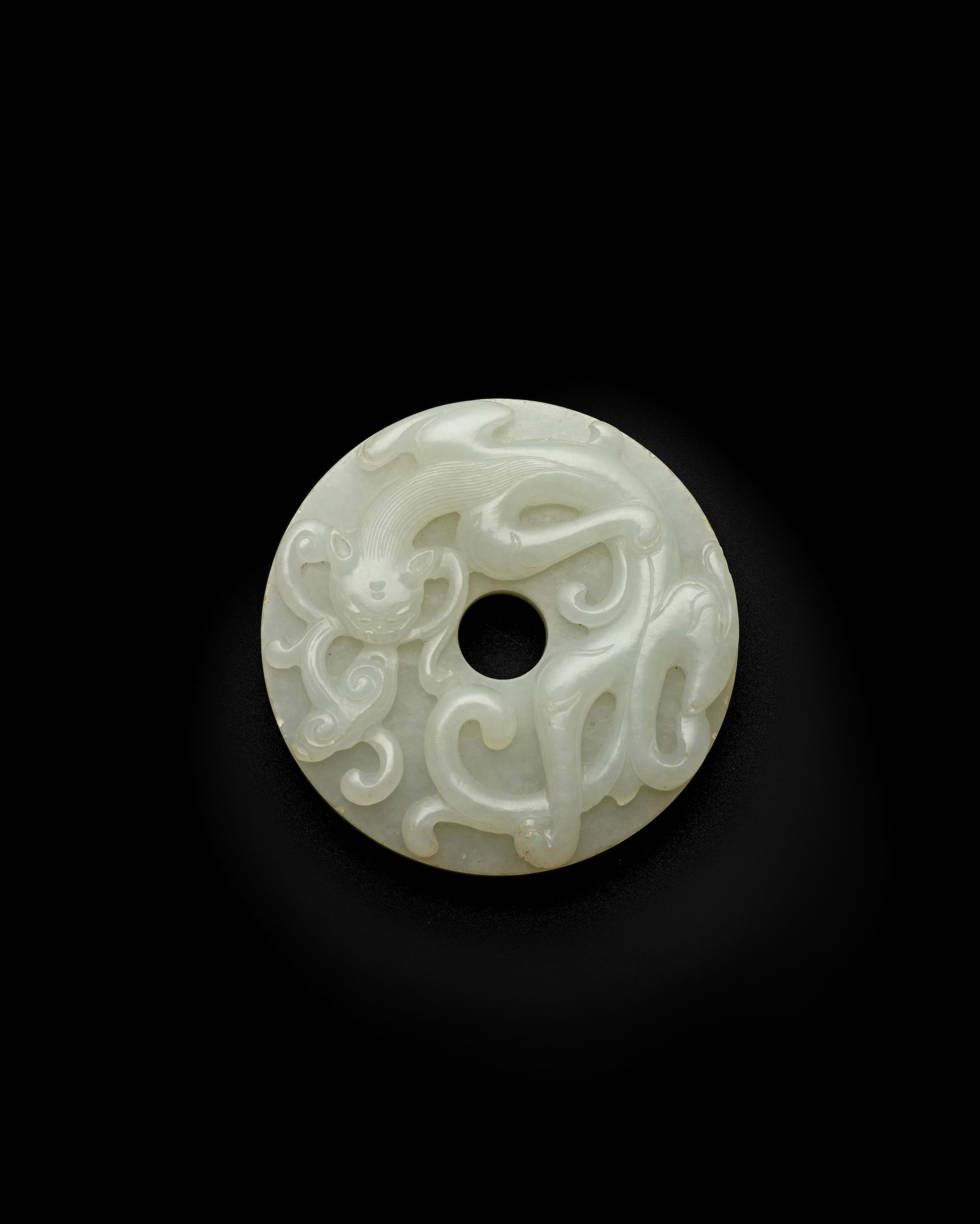 Appraisal: A WHITE JADE BI DISC WITH RELIEF CHILONG AND LINGZHI