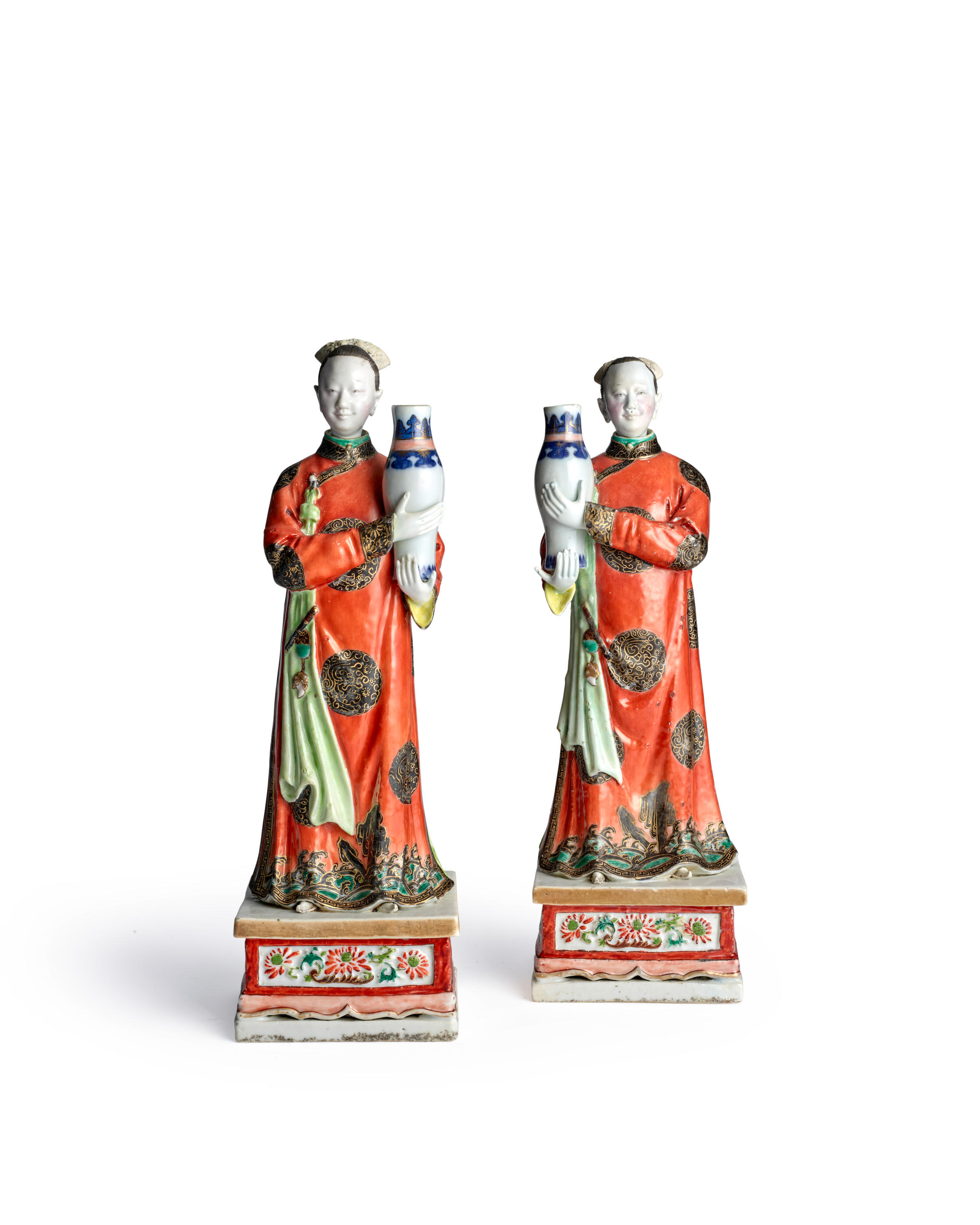 Appraisal: A PAIR OF NODDING-HEAD LADIES AS CANDLEHOLDERS Qianlong period circa