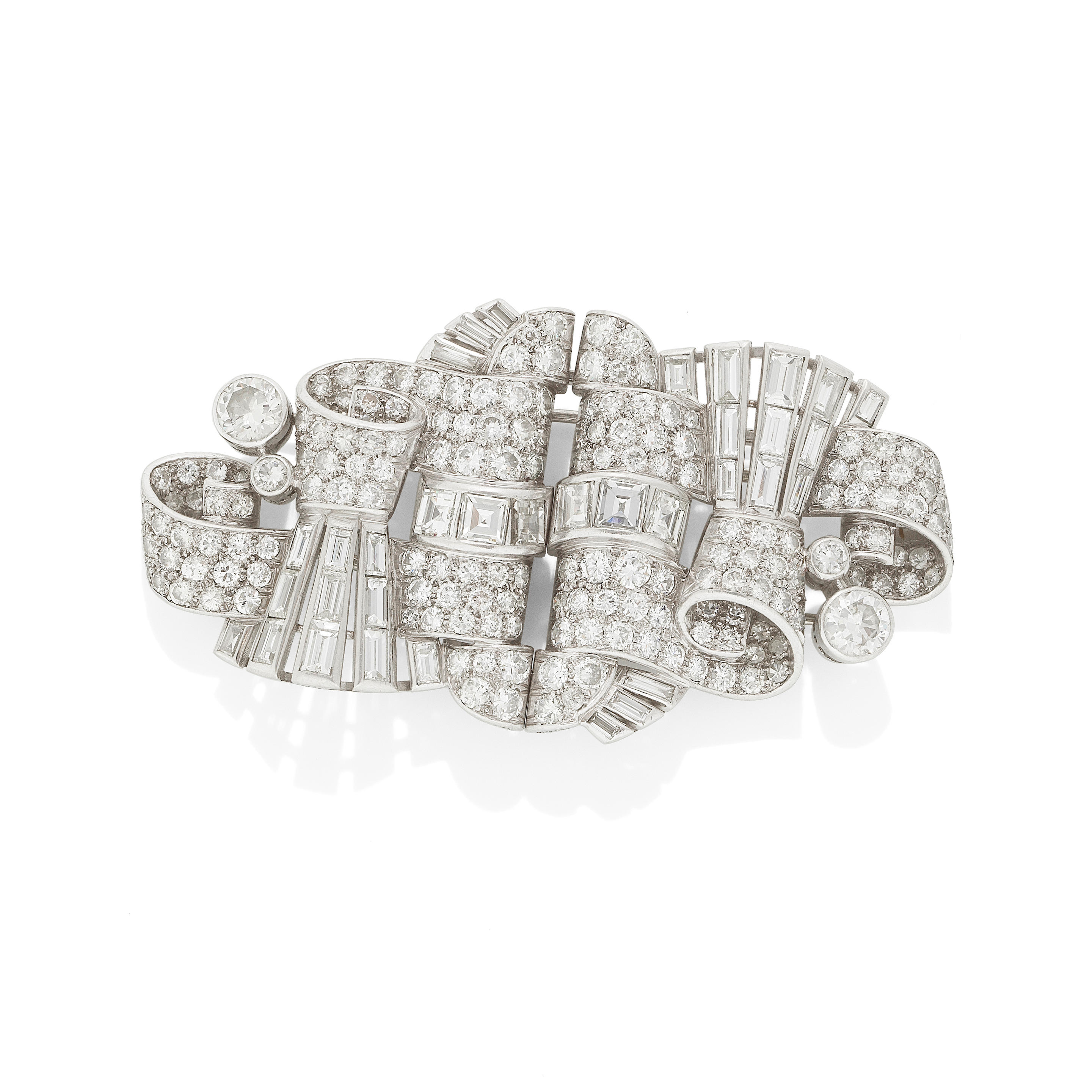 Appraisal: DIAMOND DOUBLE-CLIP BROOCH CIRCA Of openwork scroll design each channel-set