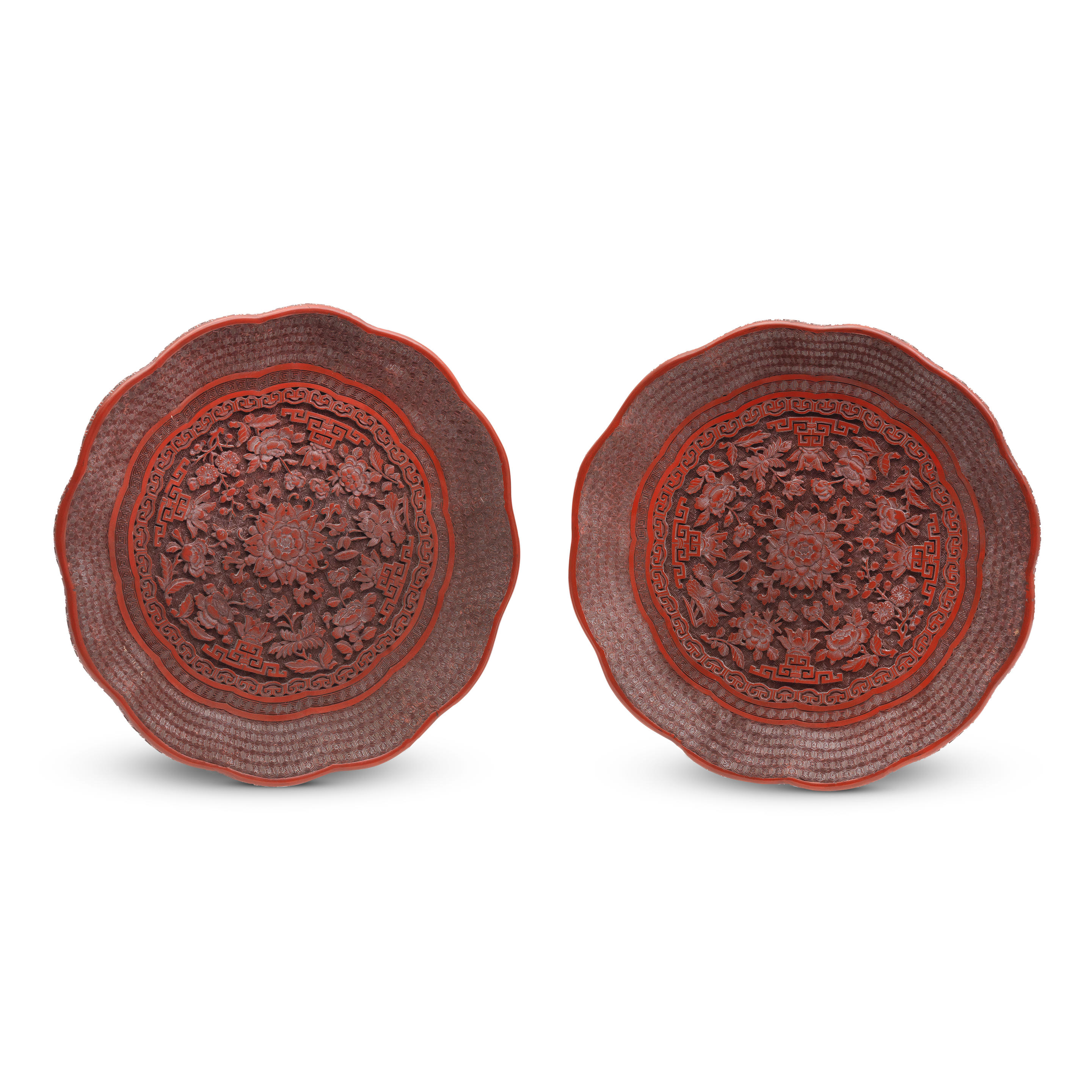 Appraisal: A PAIR OF CINNABAR LACQUER CARVED LOBED DISHES th th