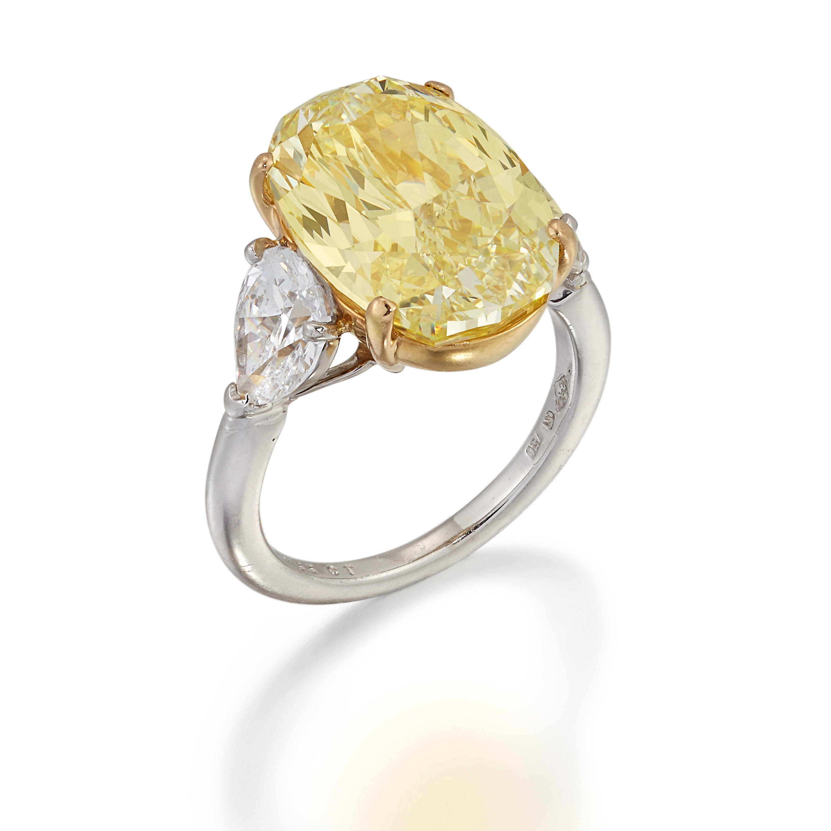 Appraisal: MOUSSAIEFF DIAMOND AND FANCY COLOURED DIAMOND RING The oval-cut Fancy