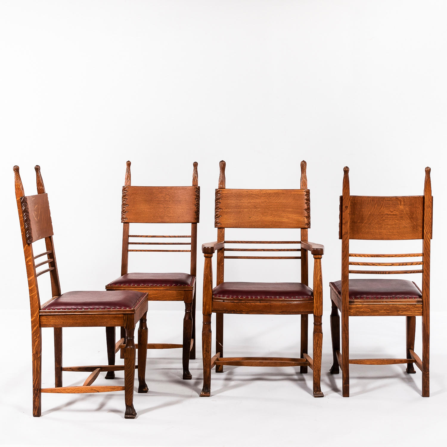 Appraisal: FOUR OAK AND LEATHER DINING CHAIRS probably United States early