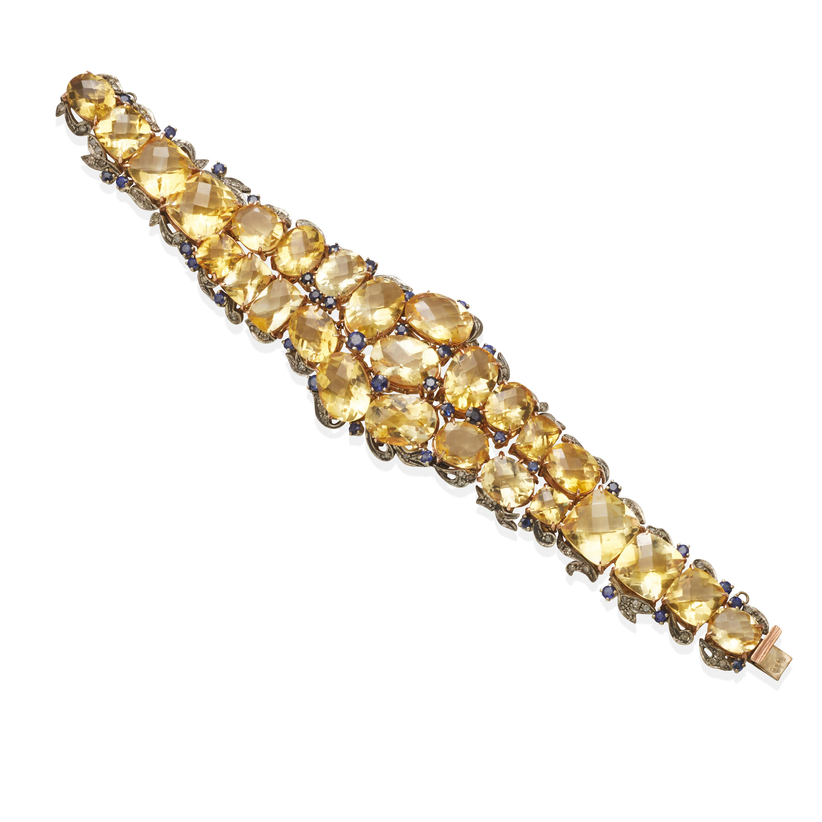 Appraisal: A CITRINE SAPPHIRE AND DIAMOND BRACELET Comprising oval and cushion-cut