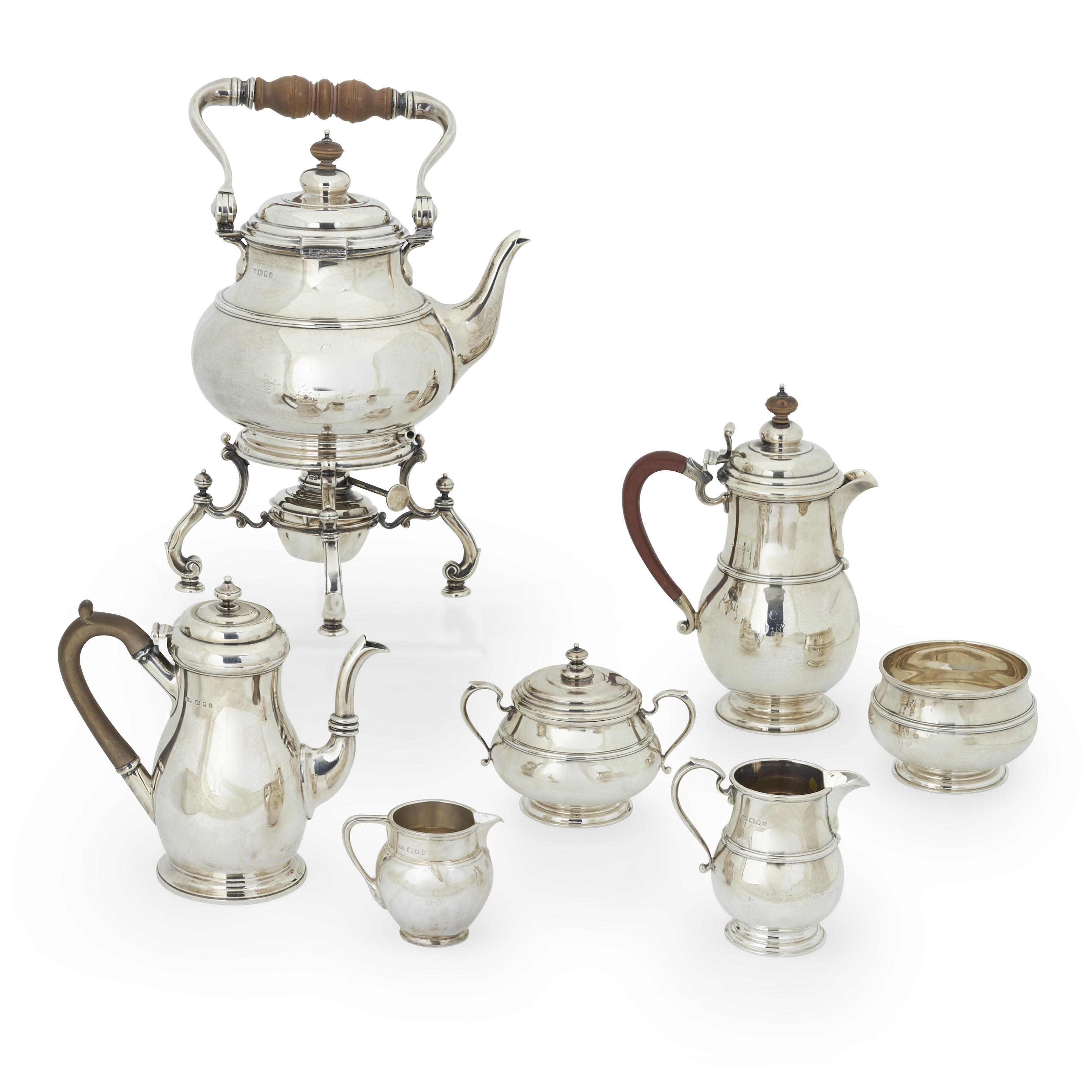 Appraisal: AN ASSEMBLED EIGHT-PIECE GEORGE V STERLING SILVER TEA SERVICE London