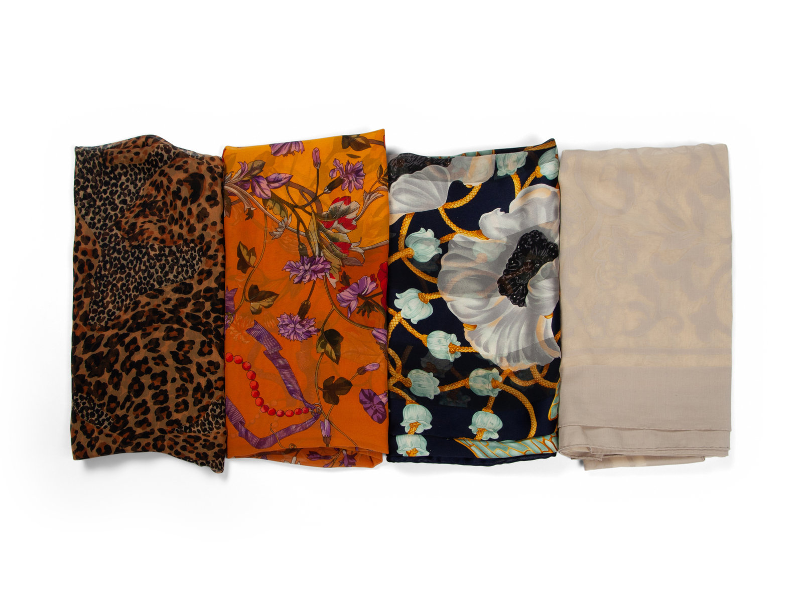 Appraisal: Four Designer Silk Scarves Including Lalique Gucci and YSL This