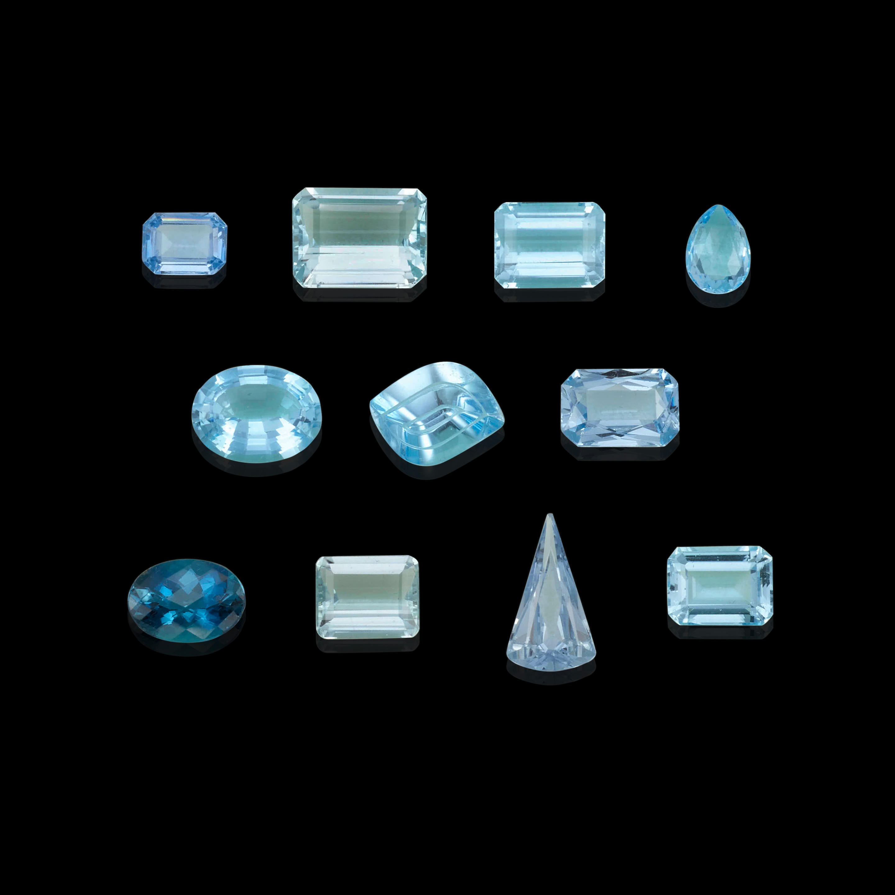 Appraisal: ELEVEN BLUE TOPAZES Group of eleven faceted blue topazes of