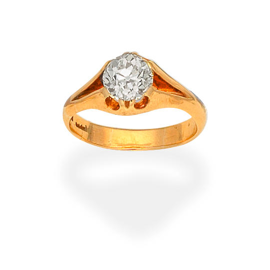 Appraisal: DIAMOND SINGLE-STONE RING Set with a cushion-shaped diamond diamond very