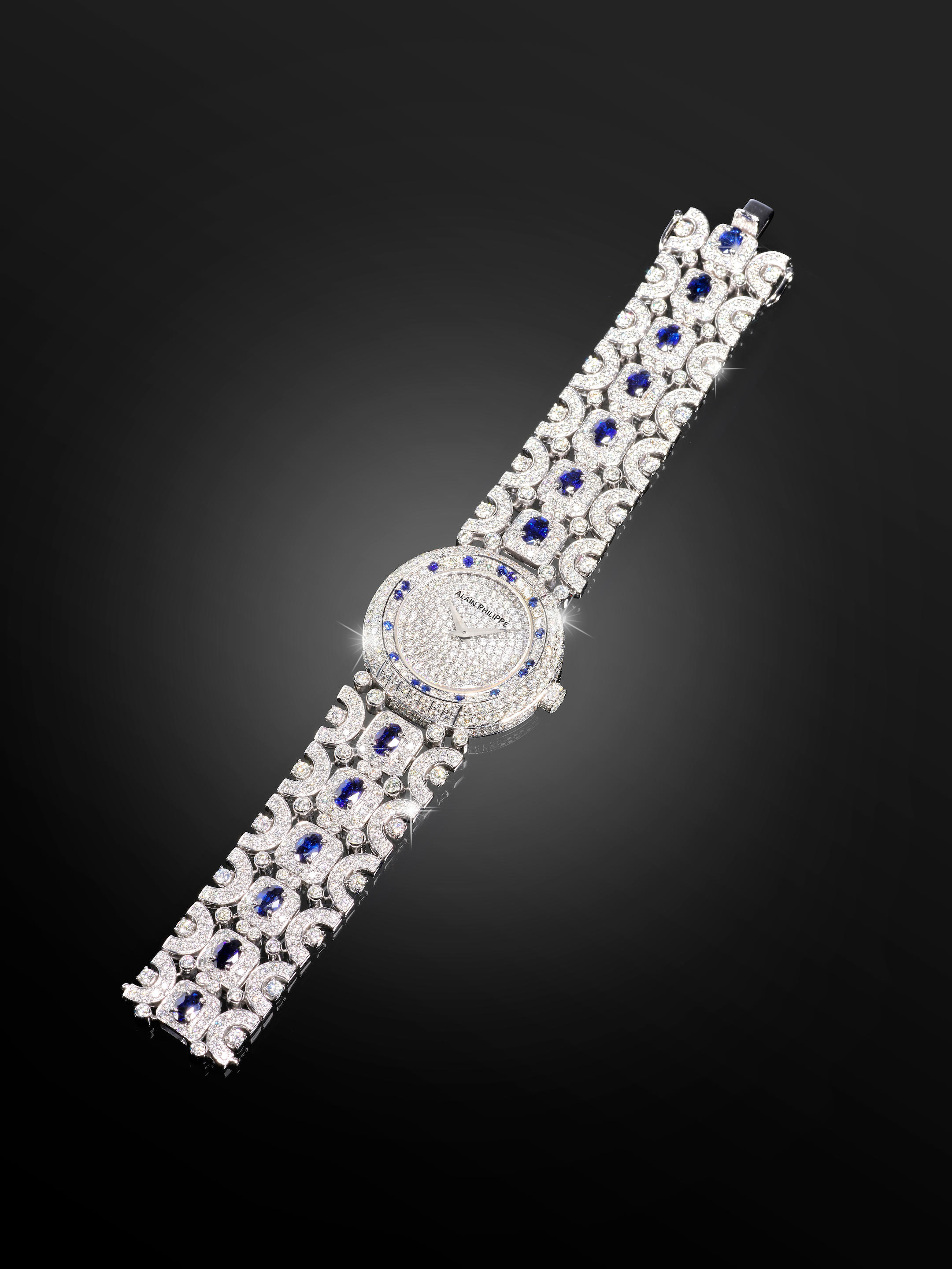 Appraisal: ALAIN PHILIPPE A FINE WHITE GOLD AND DIAMOND AND SAPPHIRE-SET