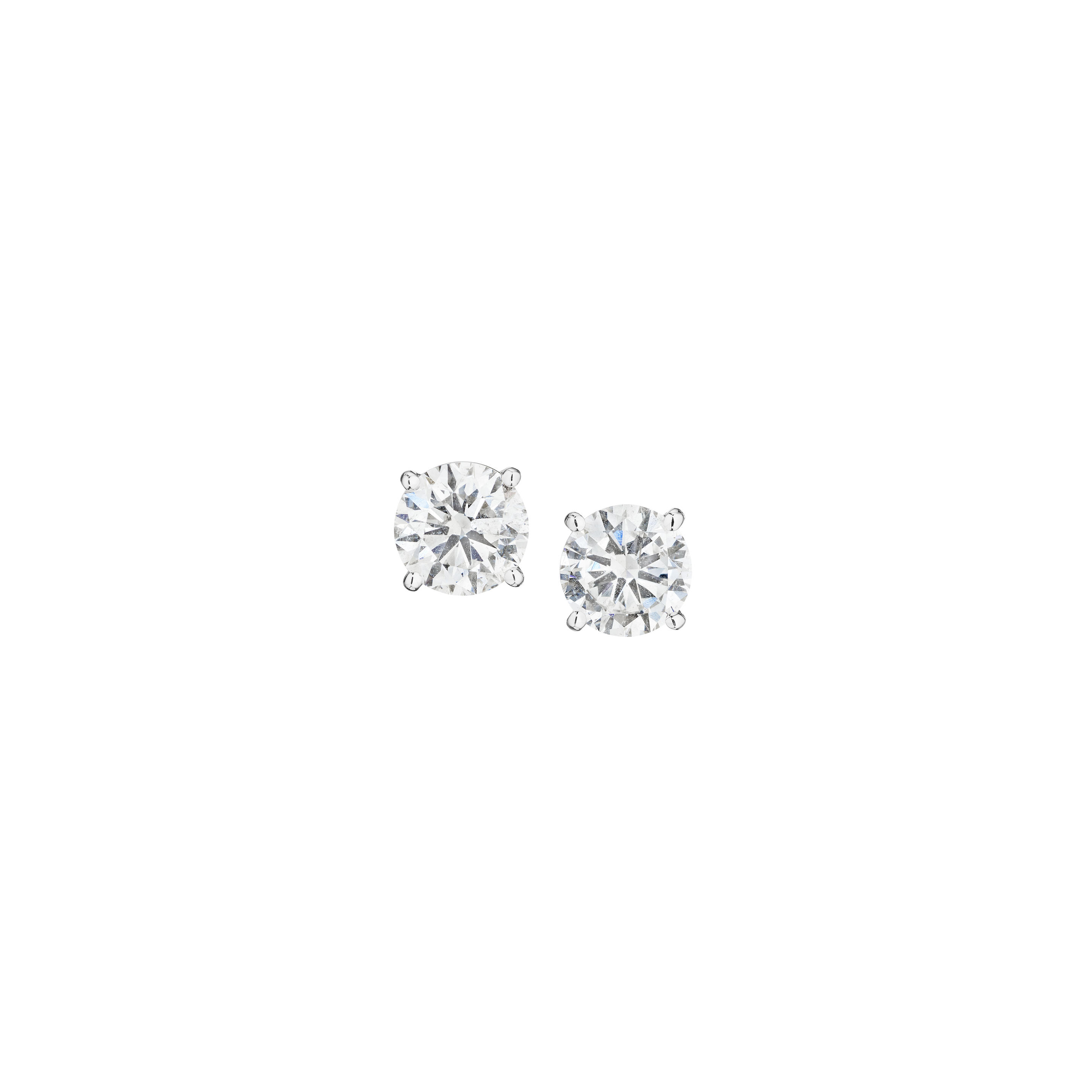 Appraisal: A PAIR OF DIAMOND STUD EARRINGS A pair of round