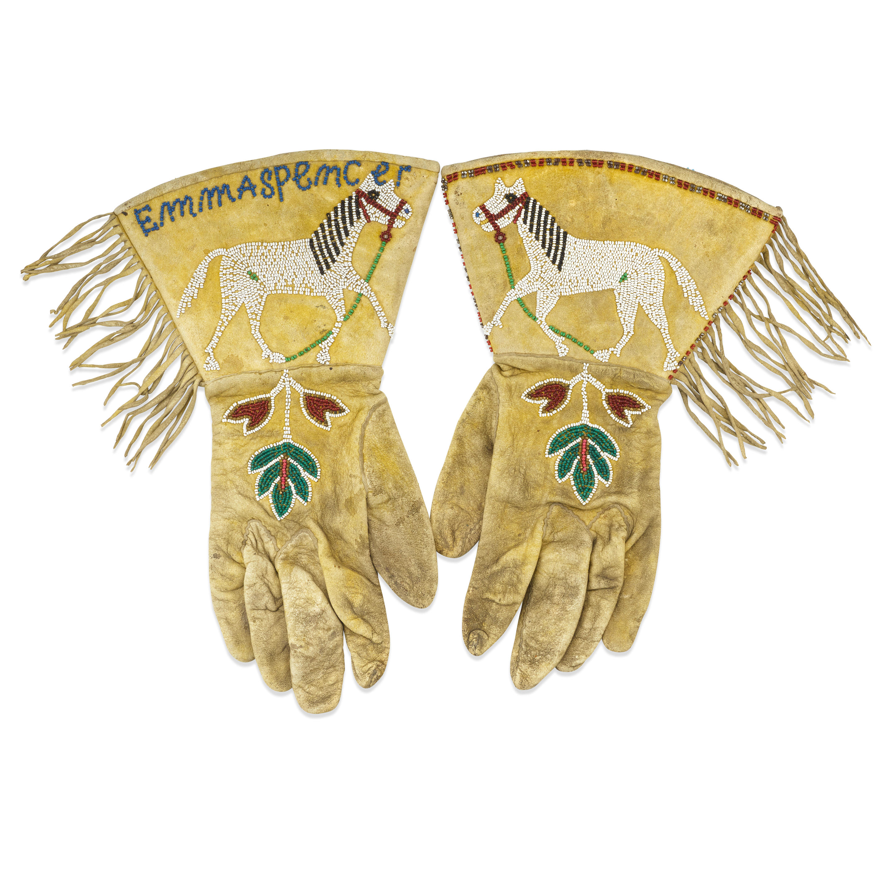 Appraisal: A PAIR OF PLATEAU PICTORIAL BEADED GAUNTLETS Each of ochre-pigmented