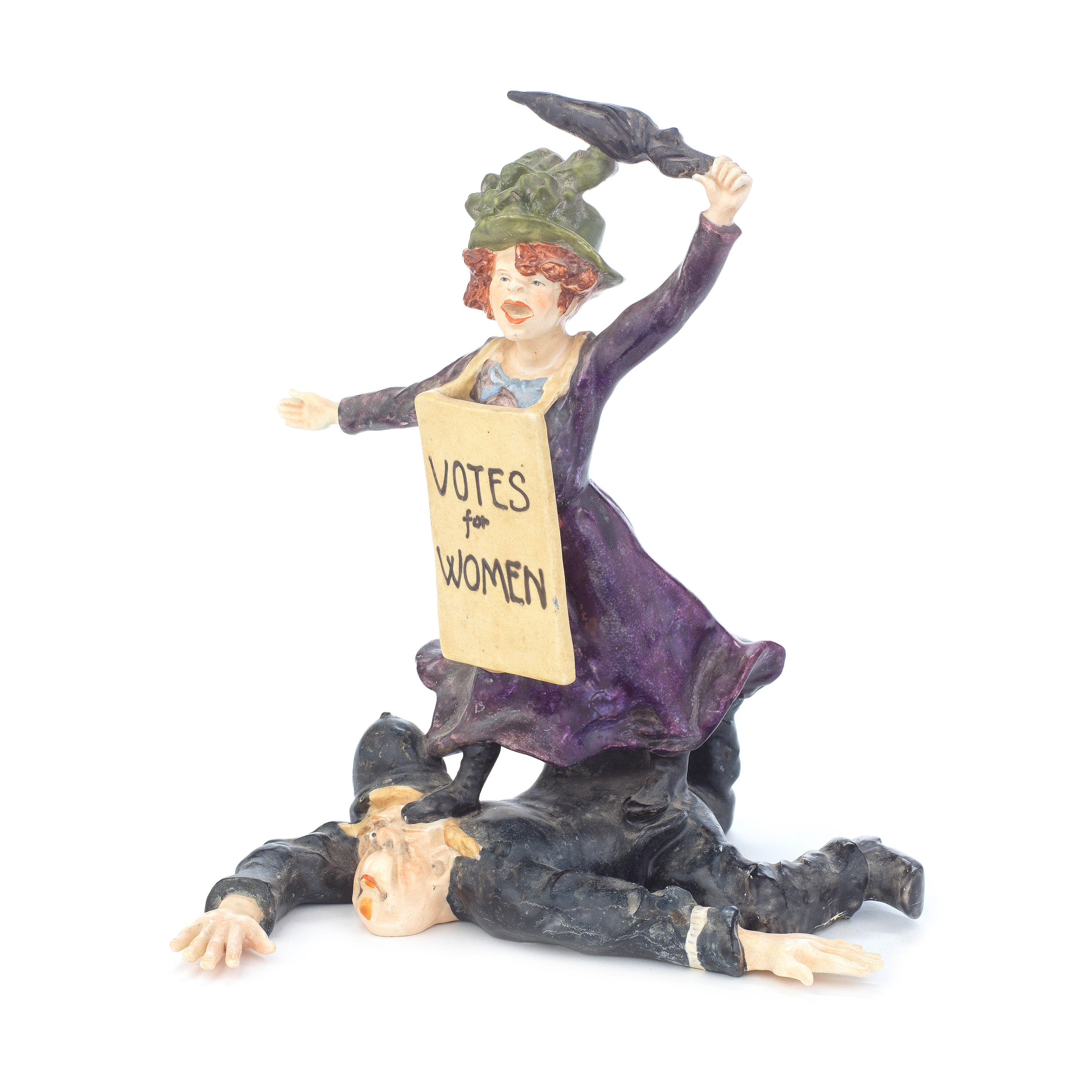 Appraisal: SUFFRAGETTE CERAMIC FIGURE GROUP Figure group depicting a victorious suffragette