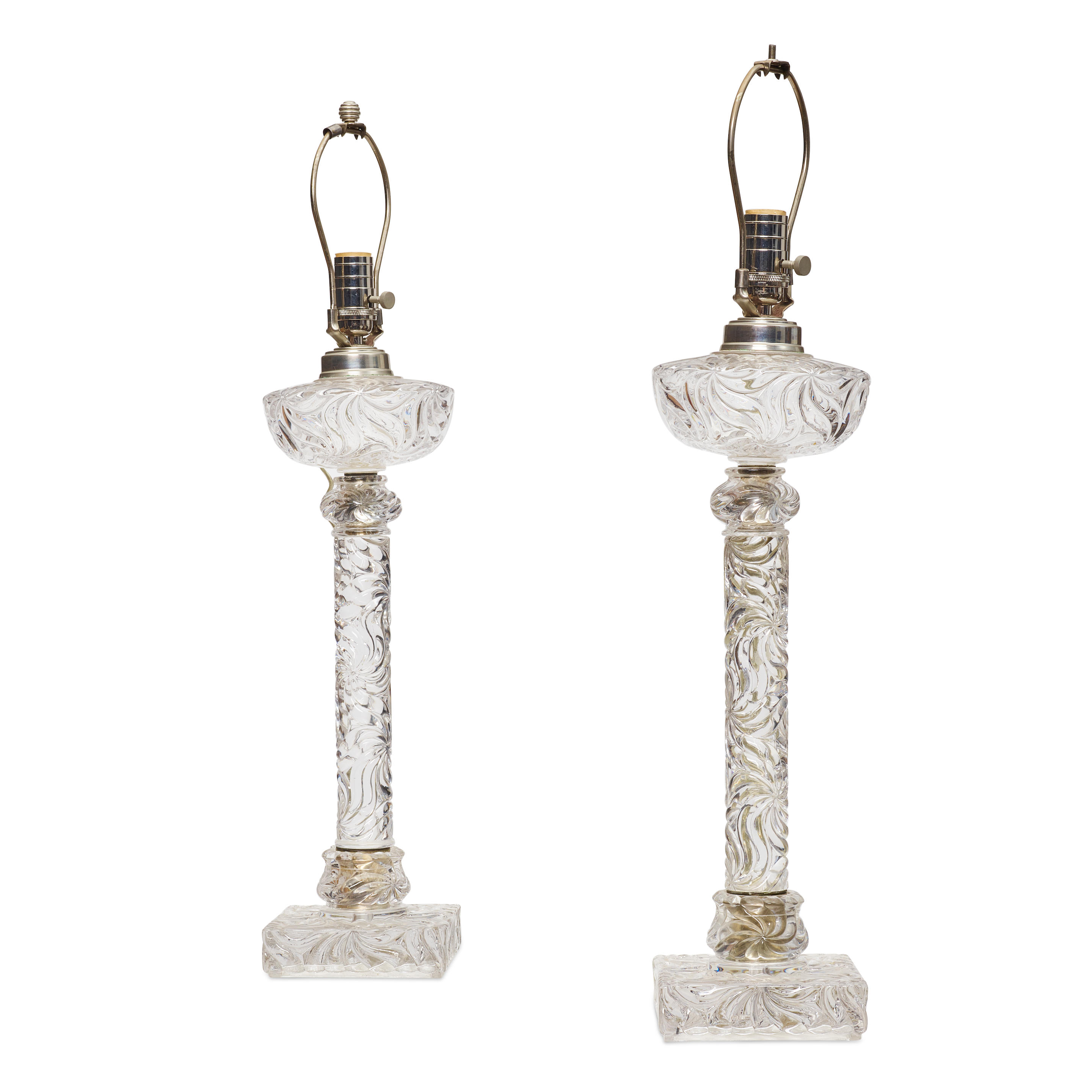 Appraisal: A PAIR OF AMERICAN COLORLESS GLASS FLUID LAMPS th century