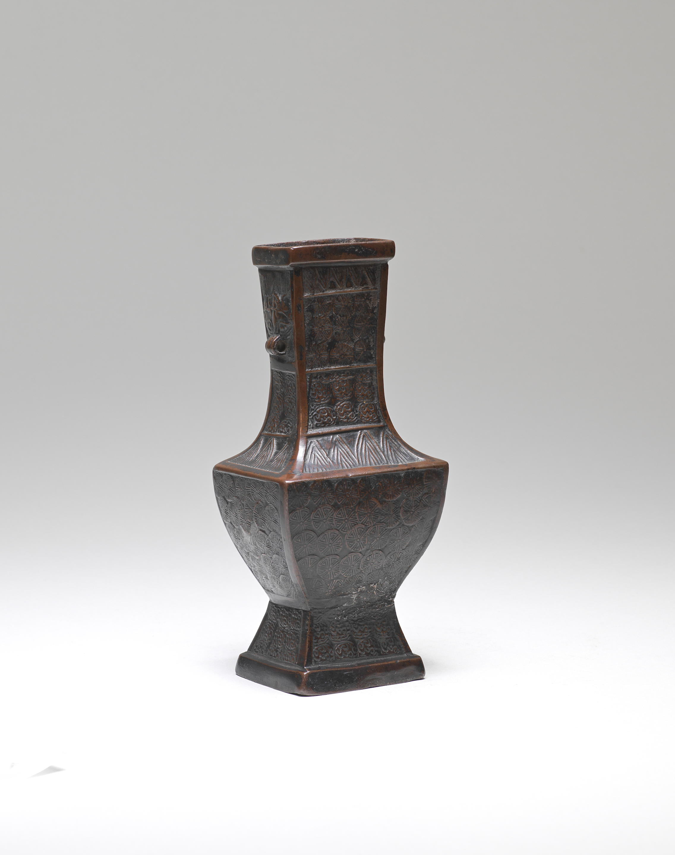 Appraisal: A BRONZE RECTANGULAR PEAR-SHAPED VASE Song Yuan Dynasty Of rectangular