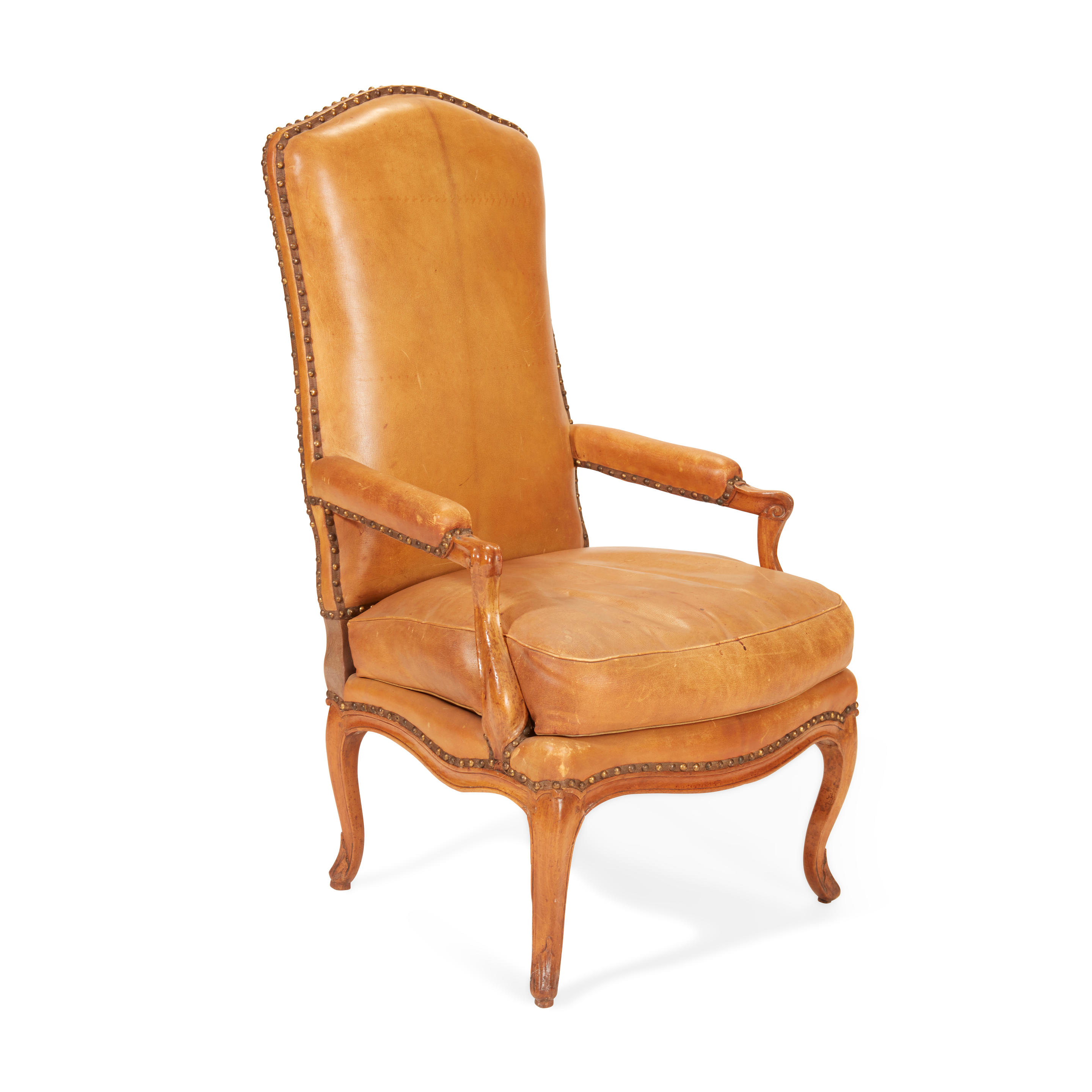 Appraisal: A LOUIS XV CARVED LEATHER UPHOLSTERED FRUITWOOD FAUTEUIL LA REINE