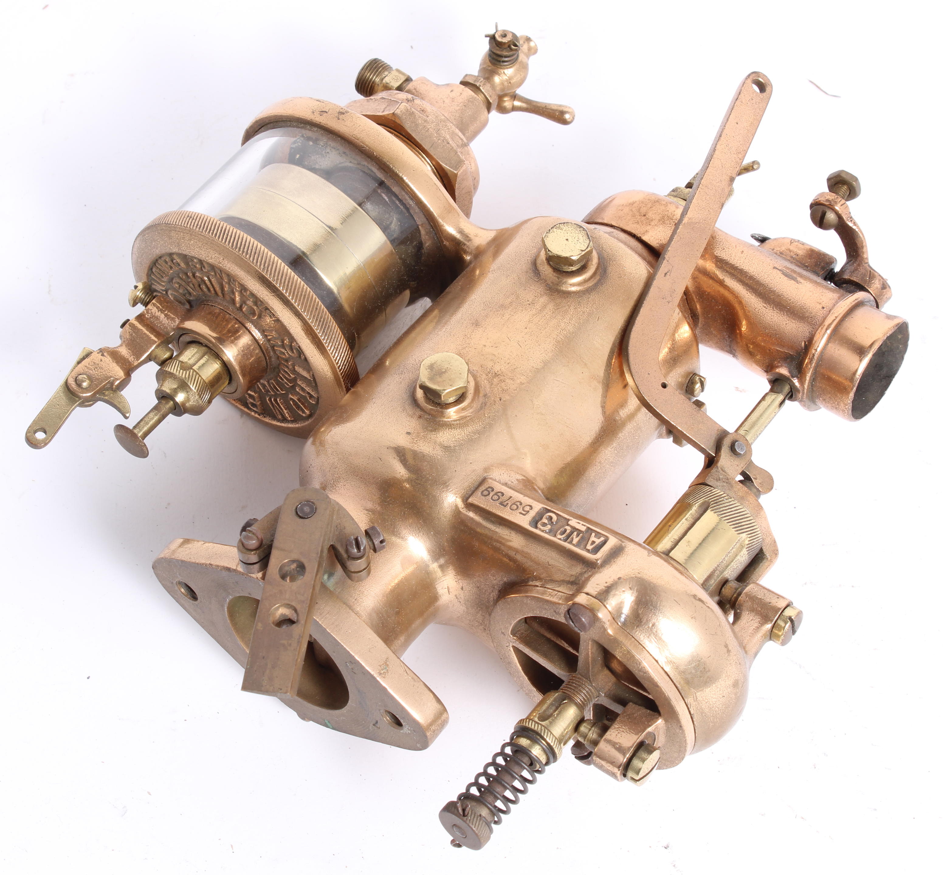 Appraisal: A STROMBERG MODEL A NO CARBURETOR polished bronze number with