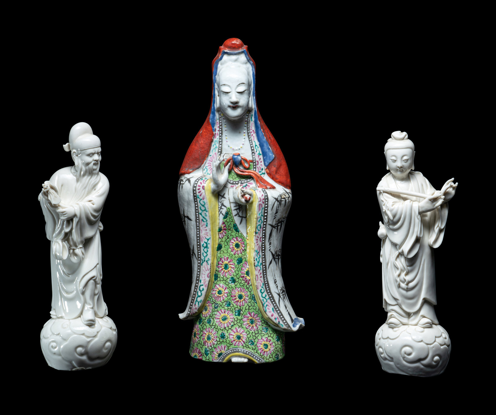 Appraisal: Three Chinese Porcelain Figures of Immortals Late th- th Century