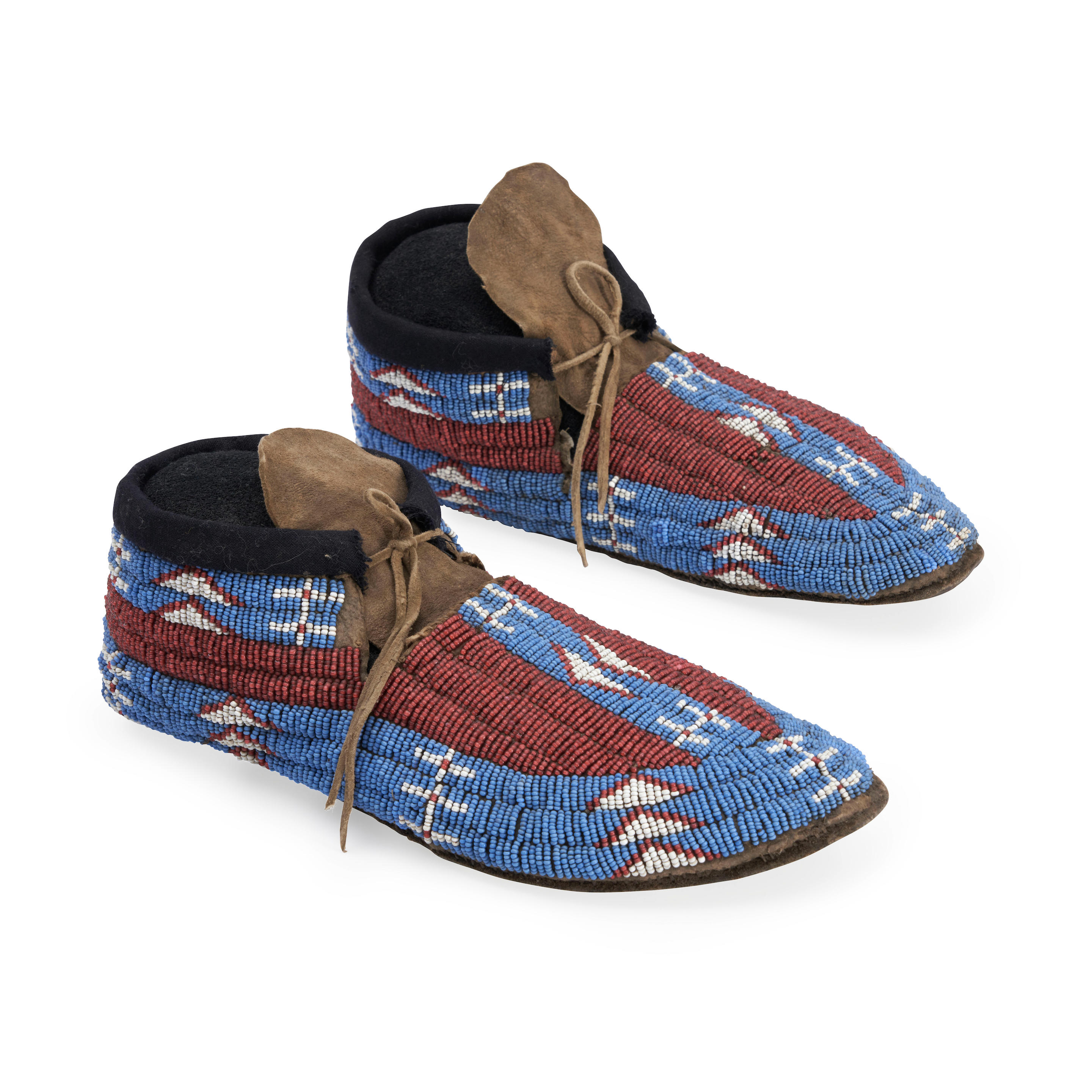 Appraisal: A PAIR OF PLAINS BEADED HIDE MOCCASINS Fourth quarter th