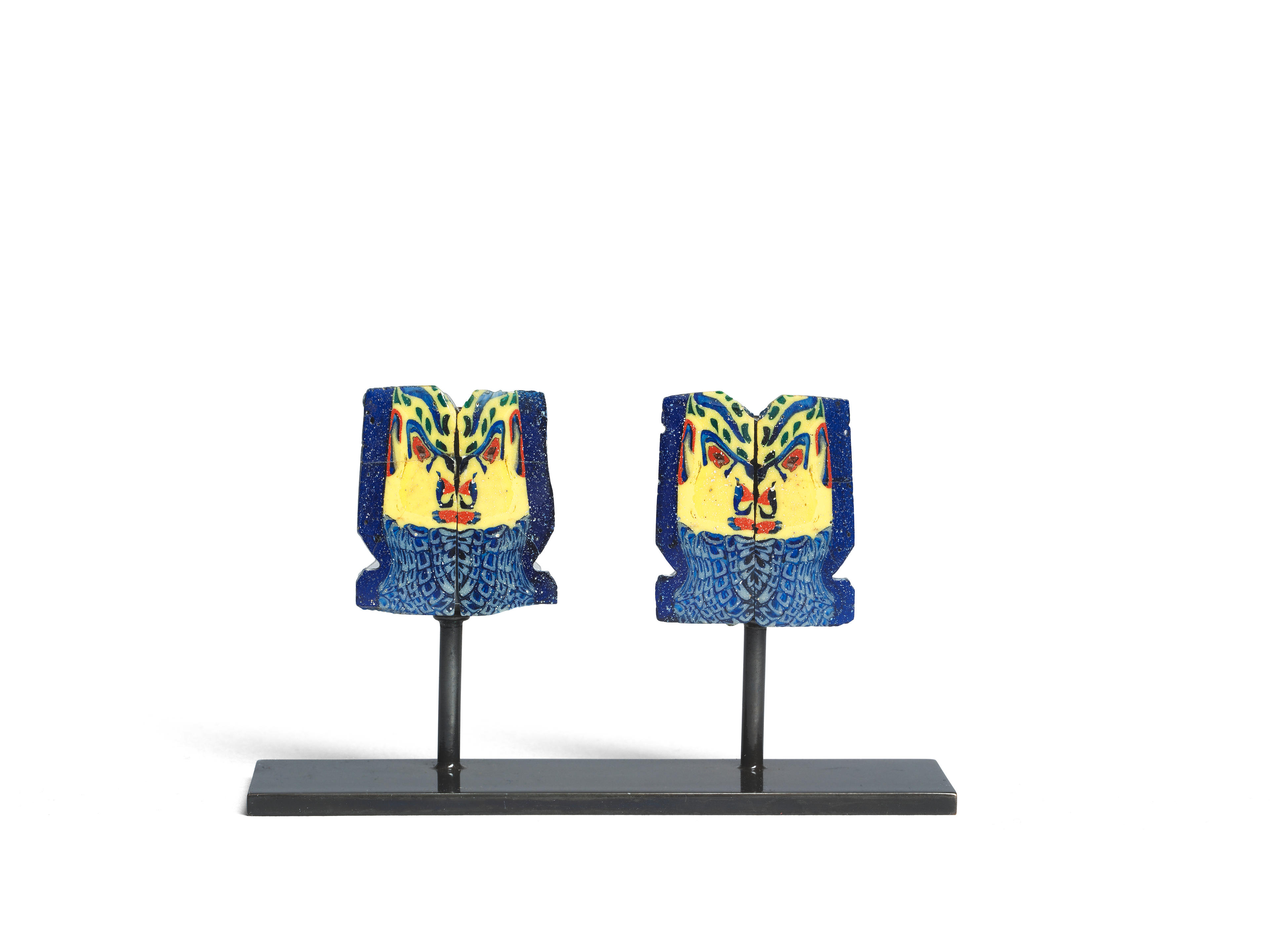 Appraisal: TWO EGYPTIAN GLASS INLAYS OF THE HEAD OF A DAIMON