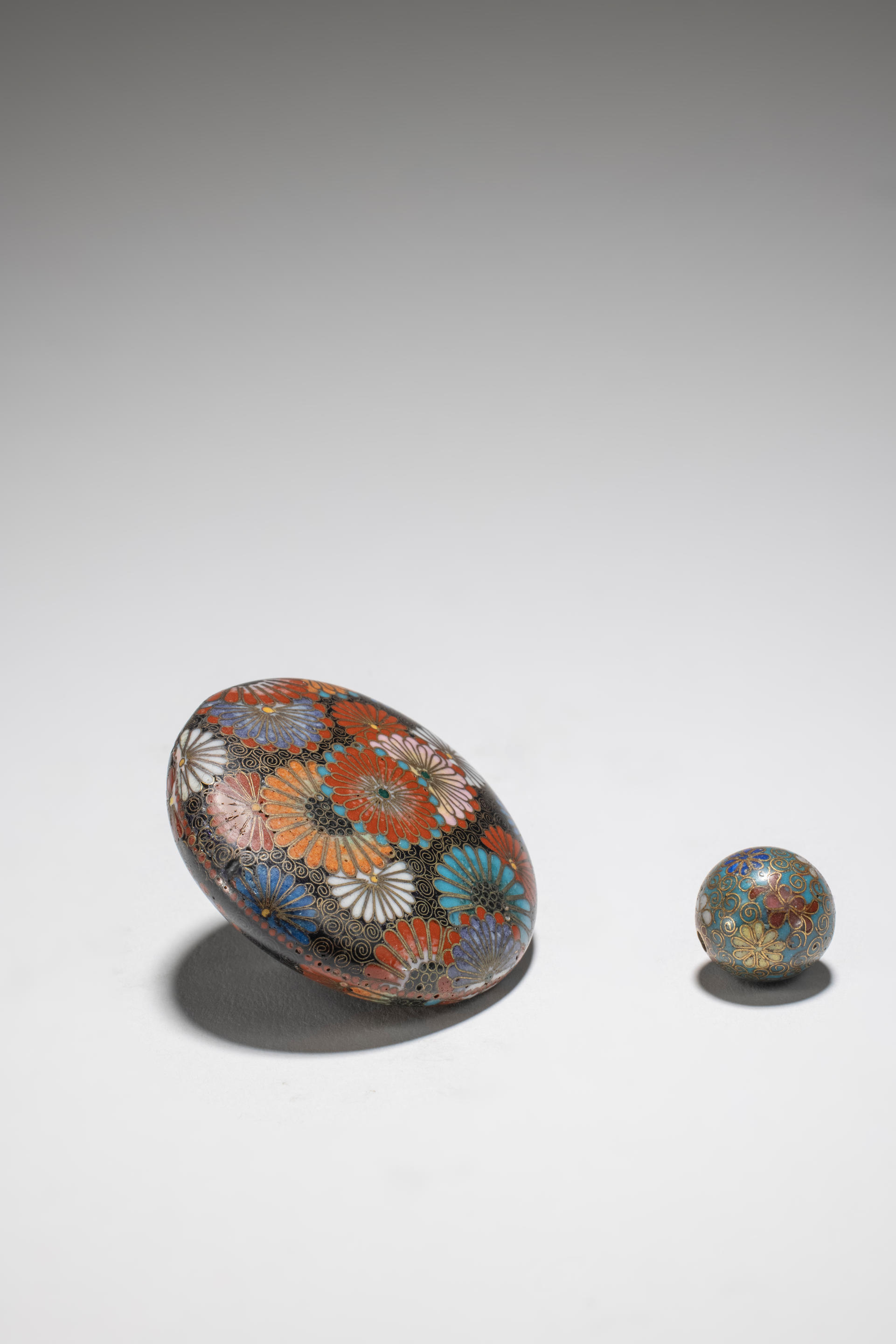 Appraisal: MANJU NETSUKE ET OJIME EN MAUX CLOISONN S XIXe si