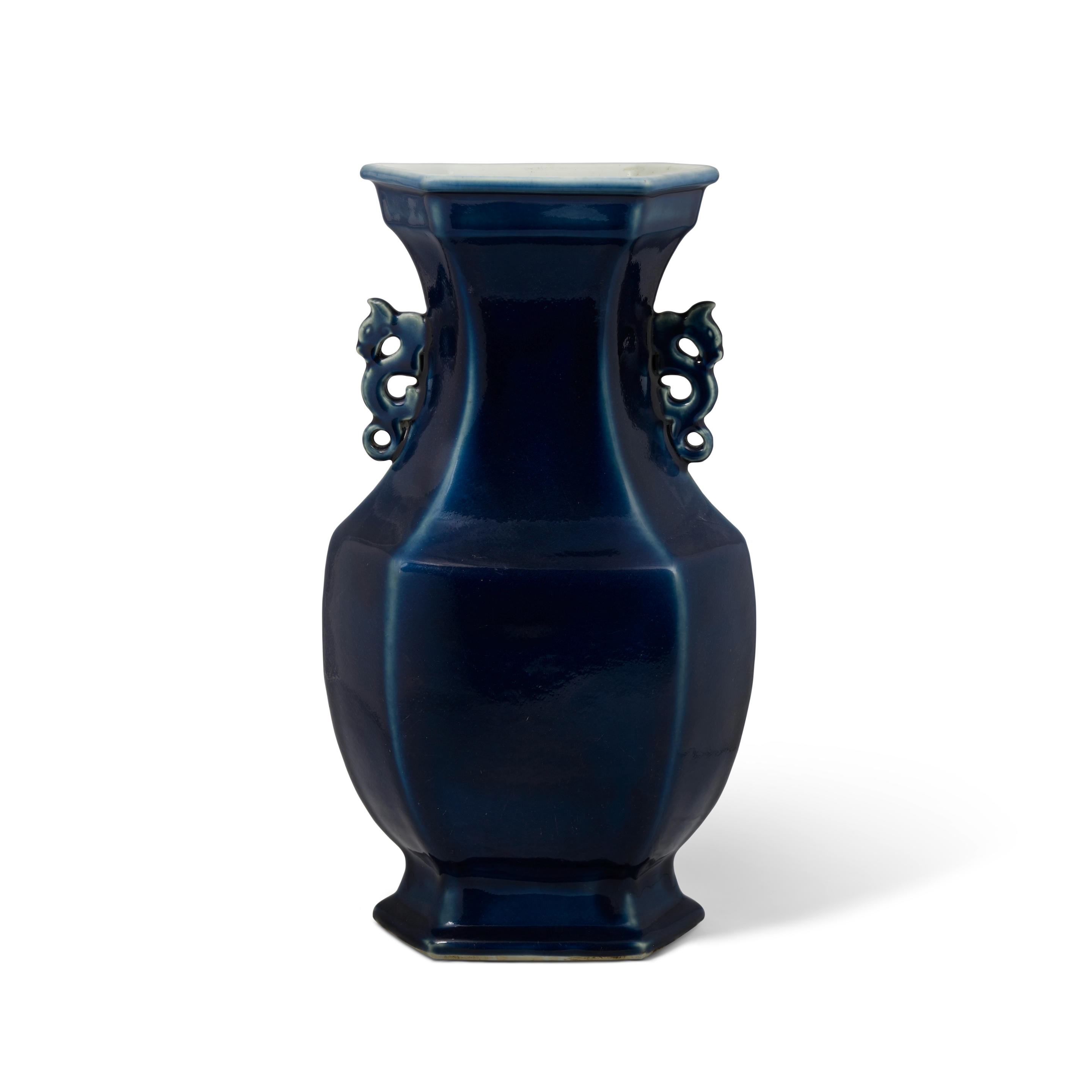 Appraisal: A BLUE-GLAZED FACTED BALUSTER VASE Early th century Of hexagonal