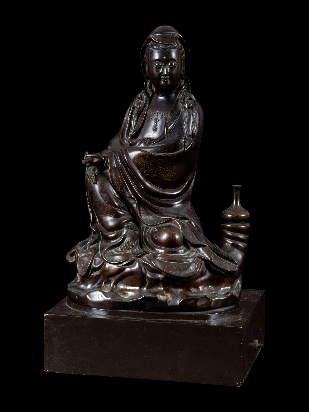 Appraisal: A Silver Inlaid Bronze Figure of Guanyin finely cast showing