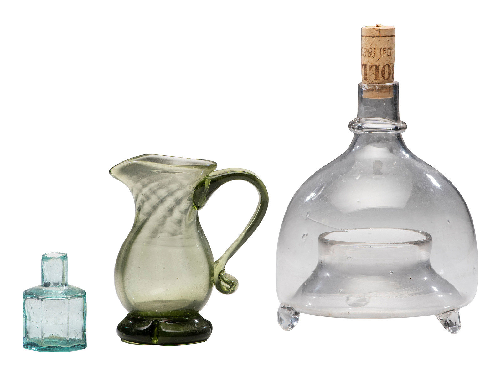 Appraisal: AMERICANA A trio of glass vessels comprising A decanter a