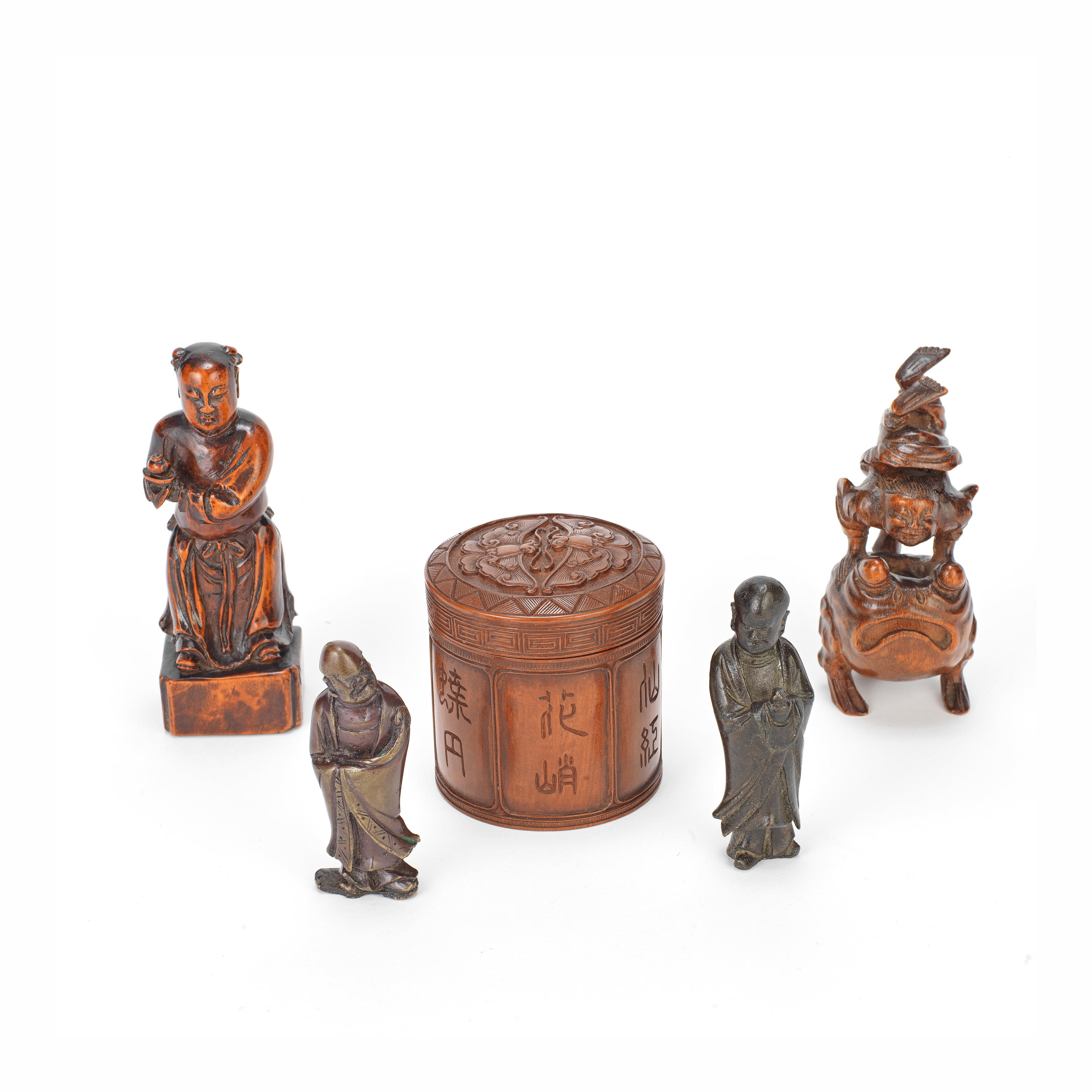 Appraisal: FOUR BRONZE AND WOOD FIGURES AND A WOOD BOX AND