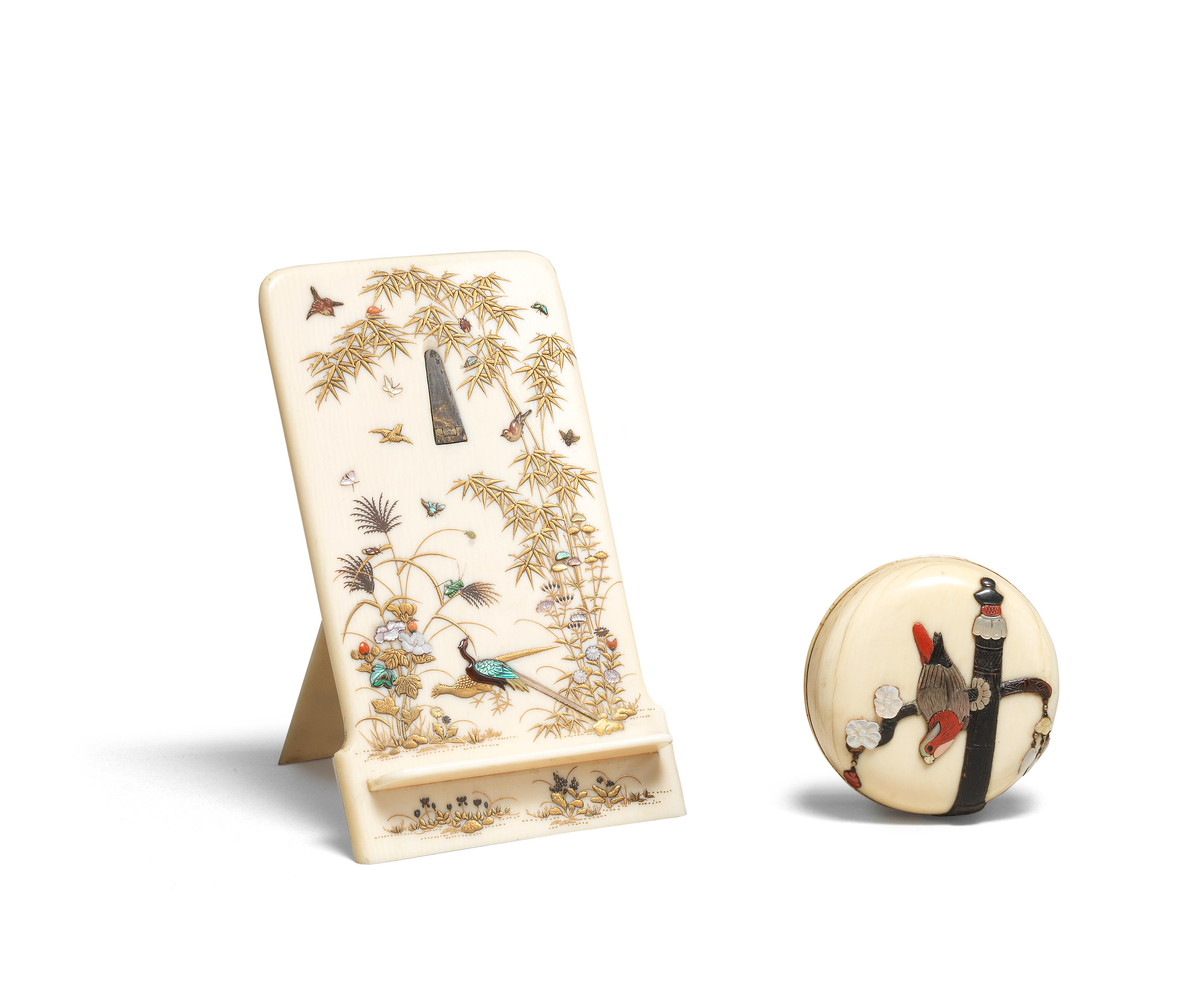 Appraisal: A SHIBAYAMA-INLAID IVORY STAND AND AN IVORY MANJU NETSUKE Meiji