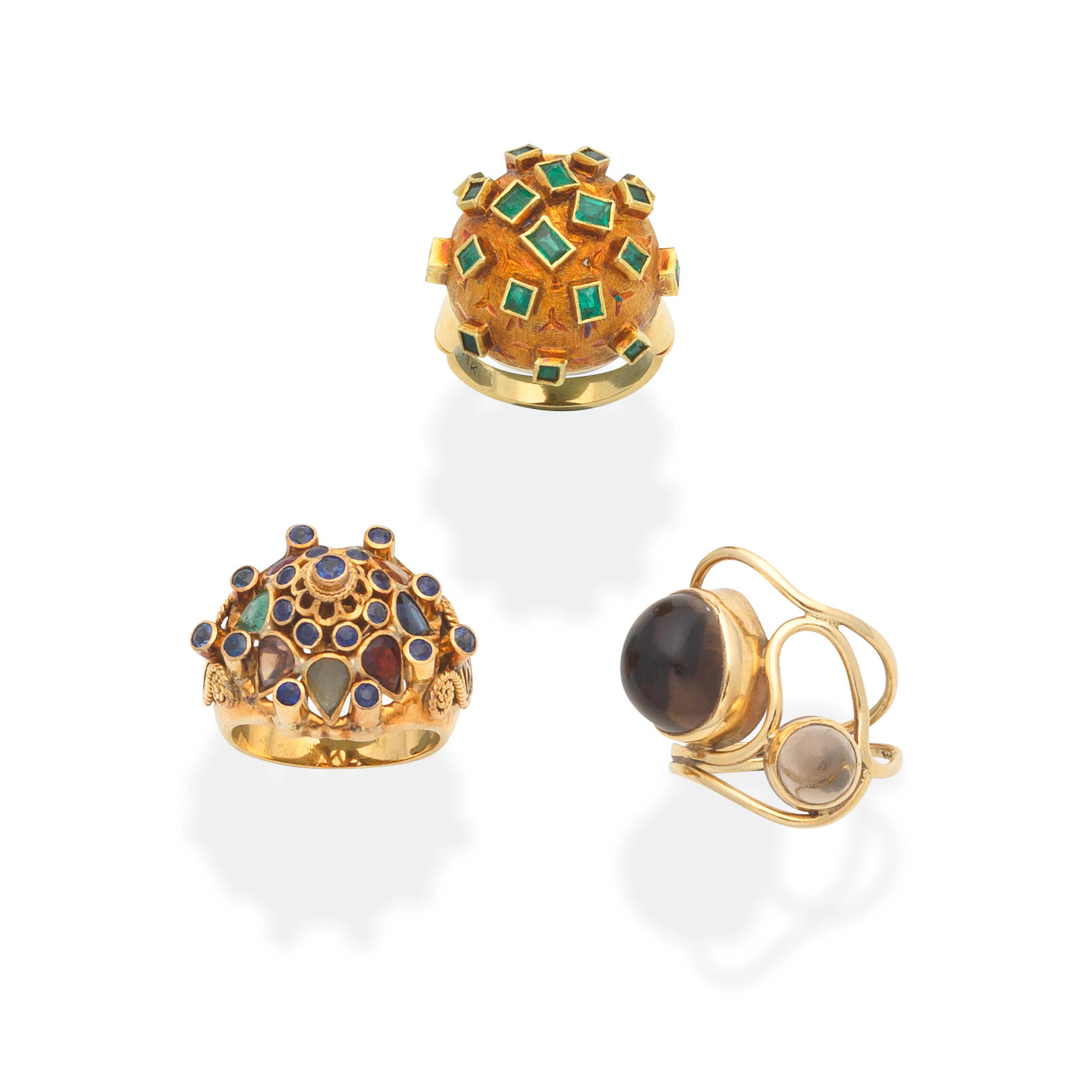 Appraisal: THREE GEM-SET DRESS RINGS st Set with step-cut emeralds nd