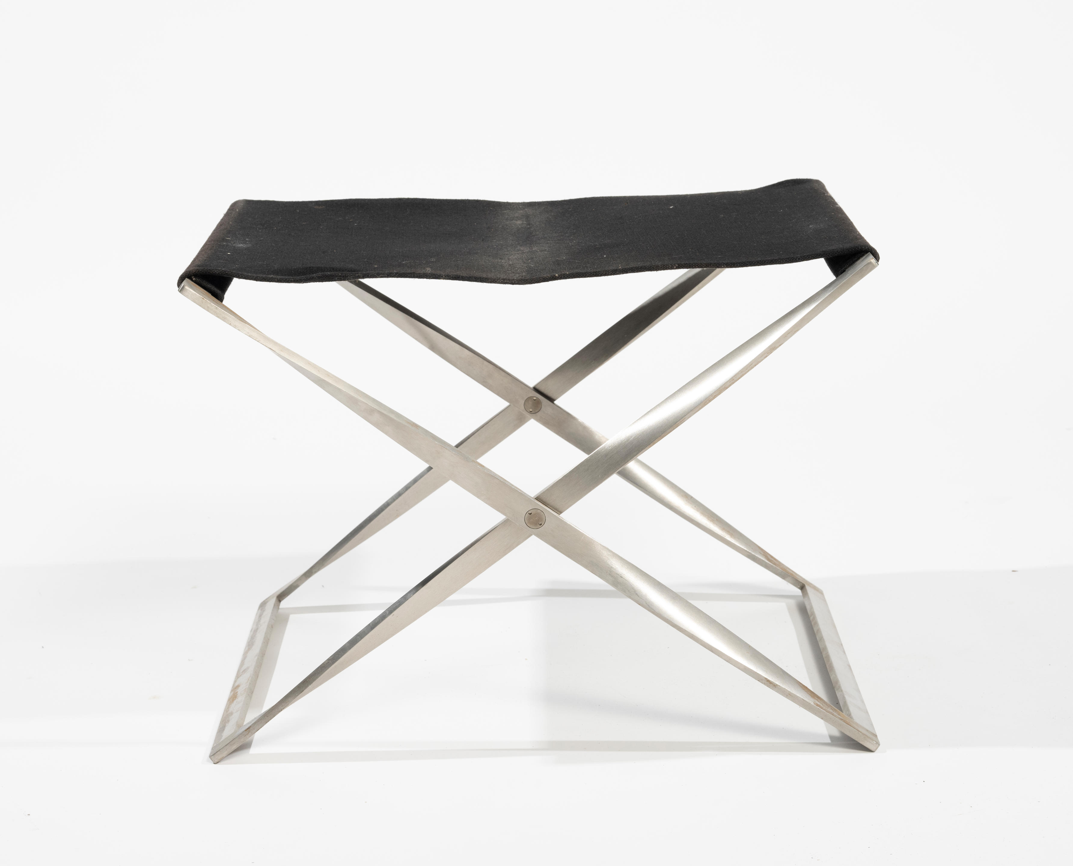 Appraisal: POUL KJAERHOLM Tabouret pliant mod PK cr ation en dition