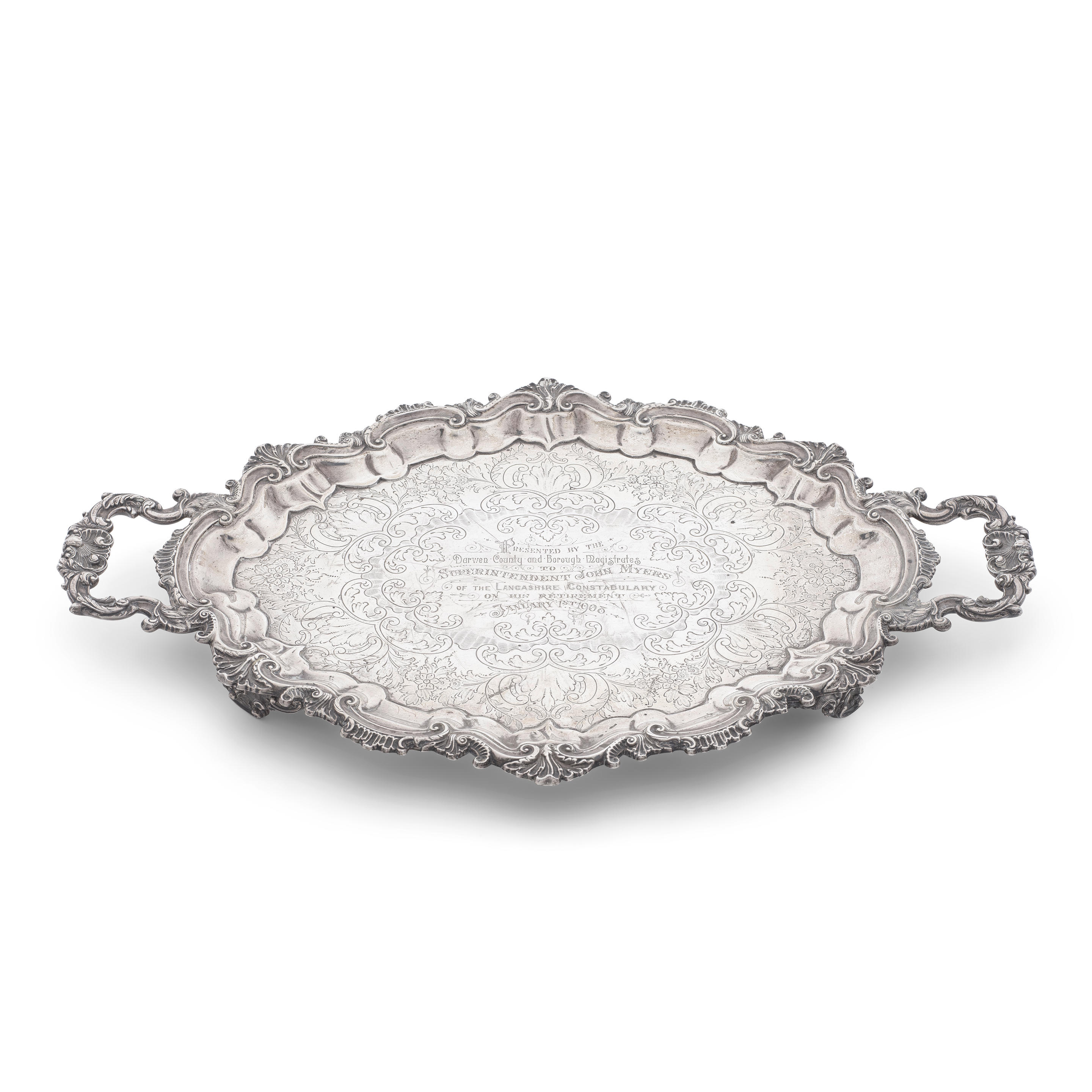 Appraisal: AN EDWARDIAN SILVER TWO-HANDLED TRAY Barker Bros Birmingham Shaped-oval form