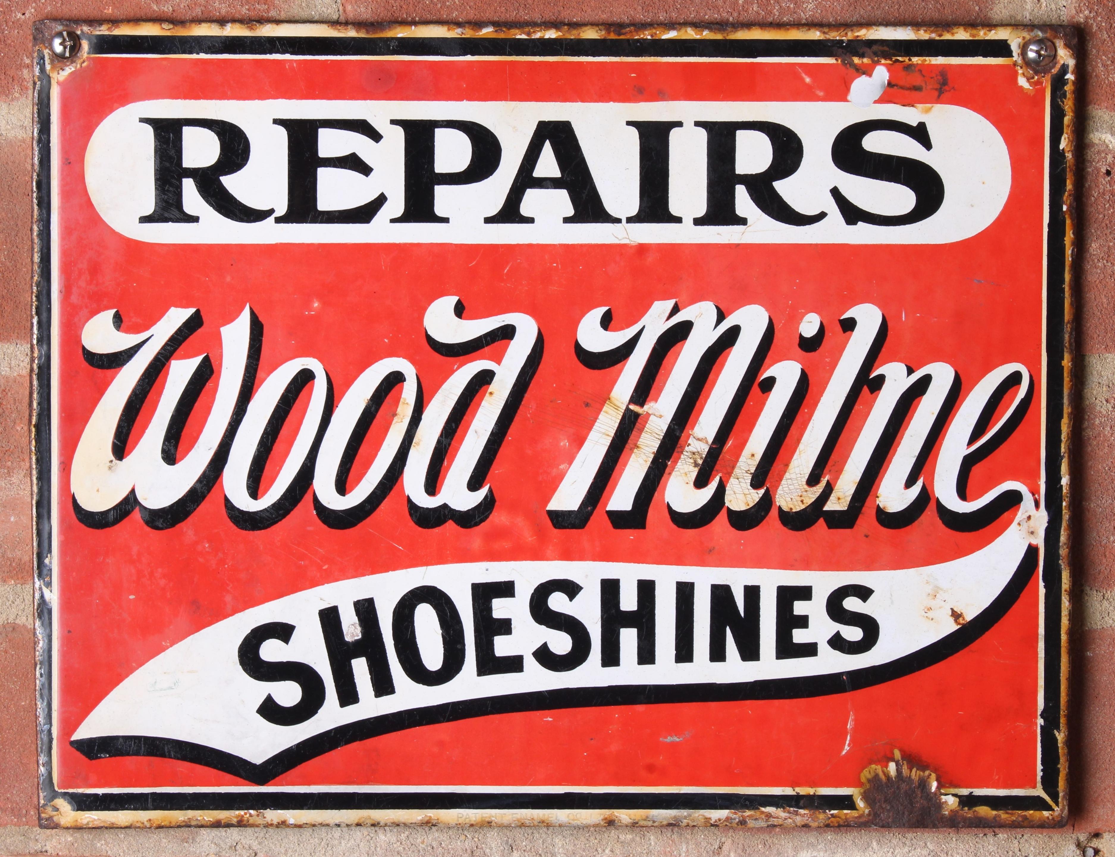 Appraisal: A WOOD MILNE SHOESHINES REPAIRS ENAMEL SIGN single-sided x cm