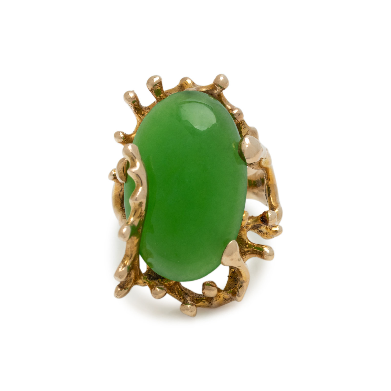 Appraisal: YELLOW GOLD AND JADE RING In a Brutalist design containing