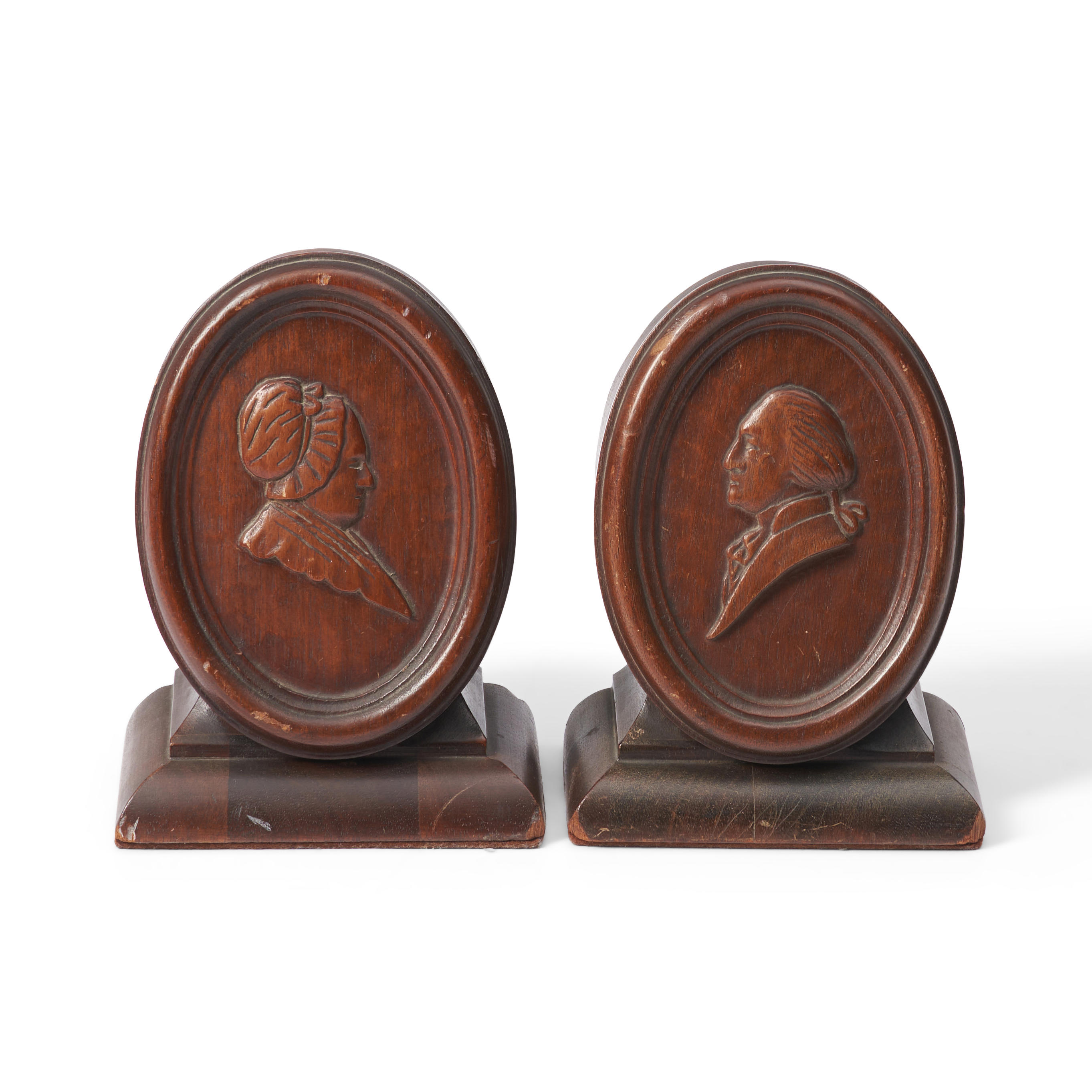 Appraisal: PAIR OF CARVED GEORGE AND MARTHA WASHINGTON BUST PORTRAITS United