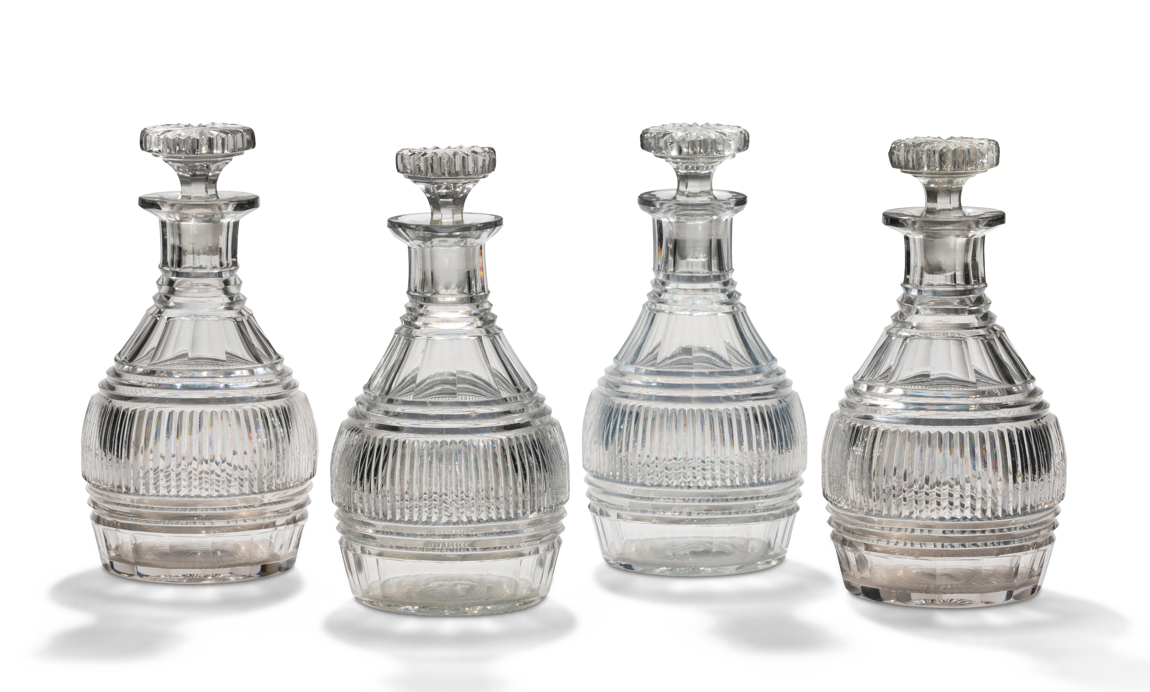 Appraisal: A SET OF FOUR EARLY TH CENTURY CUT-GLASS DECANTERS With