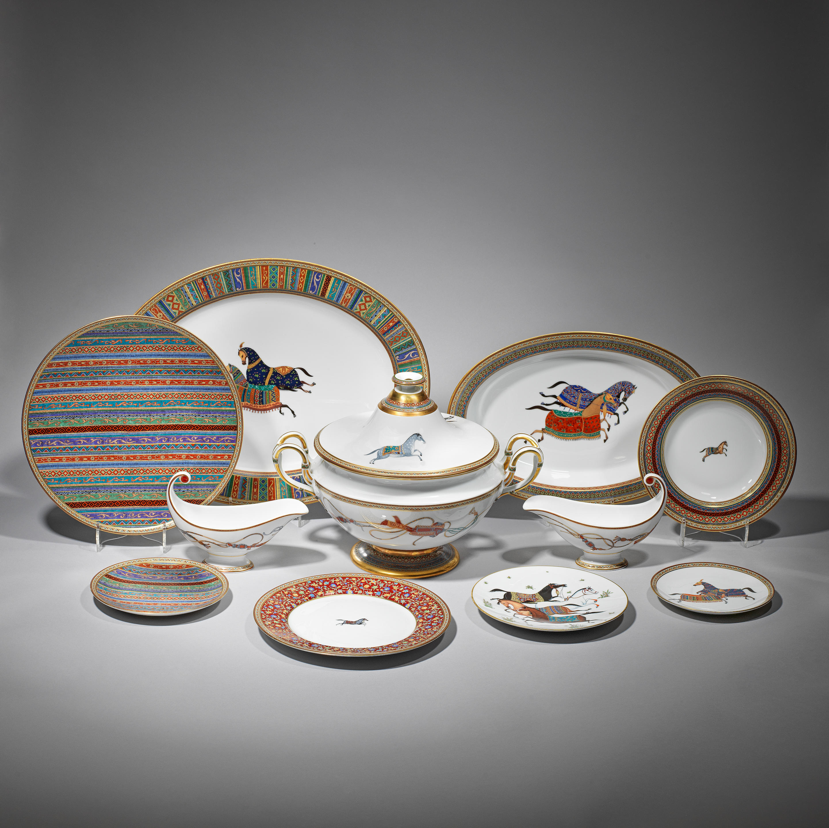 Appraisal: HERM S 'Cheval d'Orient' dining service for ten st Century