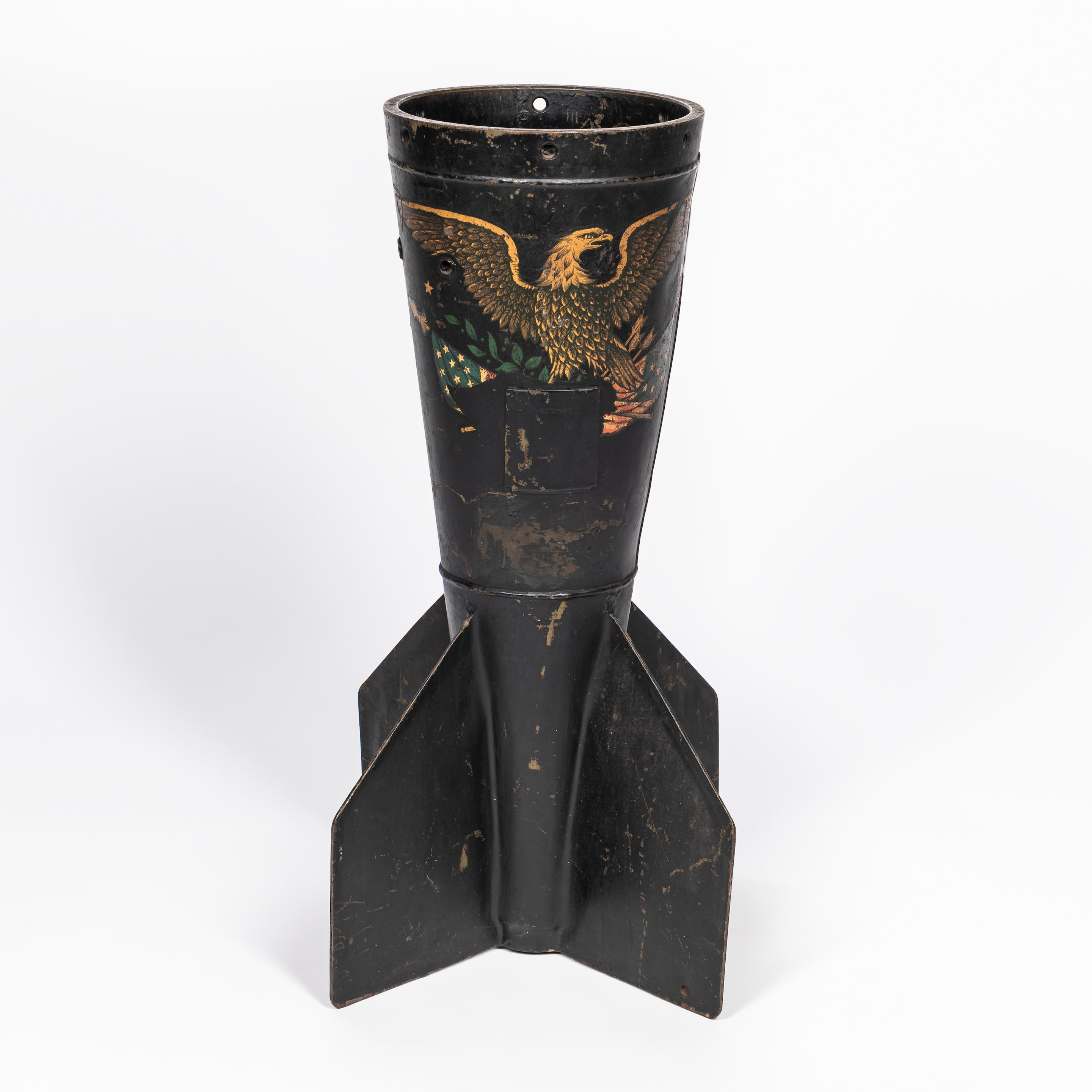 Appraisal: EAGLE-PAINTED MISSILE BASE UMBRELLA STAND The black-painted body with four