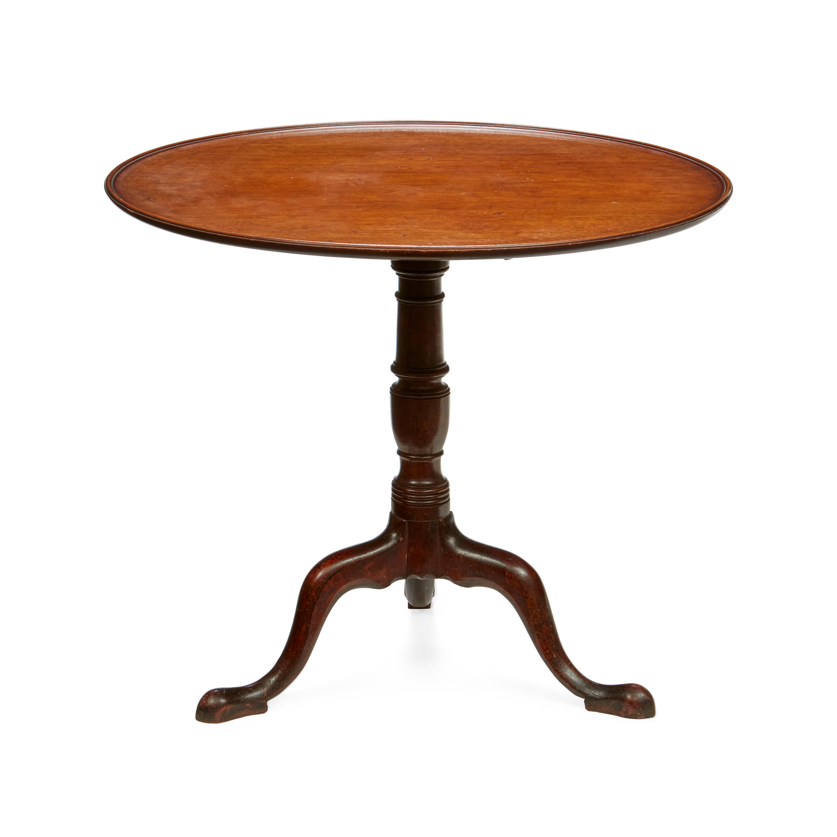 Appraisal: A GEORGE II PROVINCIAL MAHOGANY TILT-TOP TRIPOD TEA TABLE Mid-