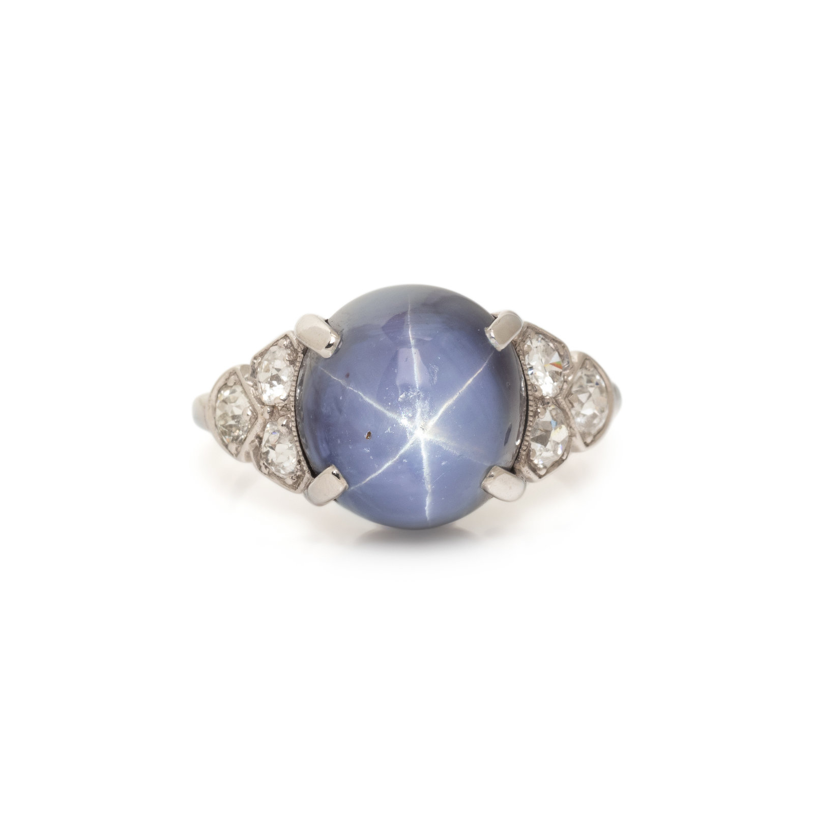 Appraisal: STAR SAPPHIRE AND DIAMOND RING Oval cabochon cut star sapphire