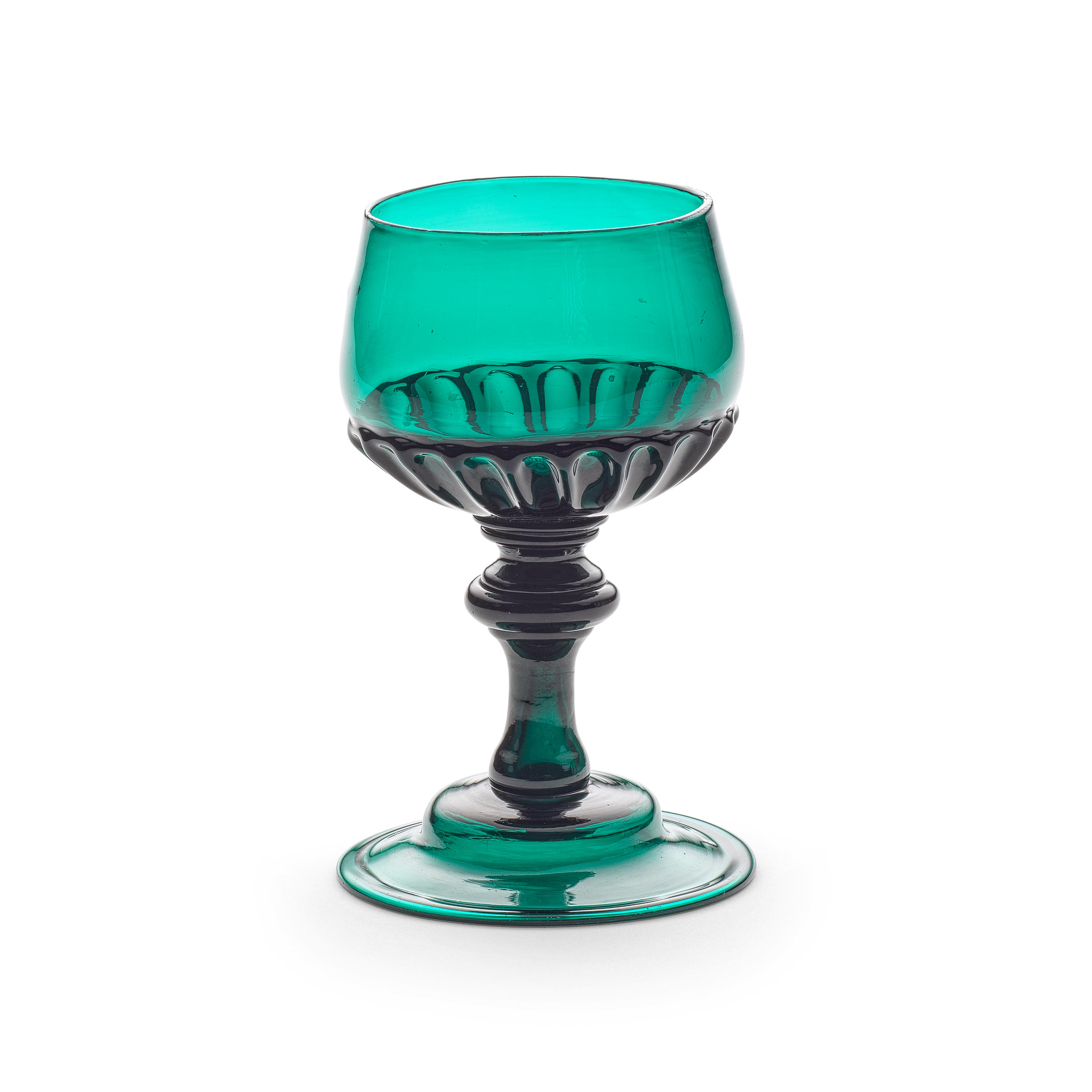 Appraisal: A RARE EMERALD-GREEN TINTED BALUSTER CHAMPAGNE OR WINE GLASS CIRCA