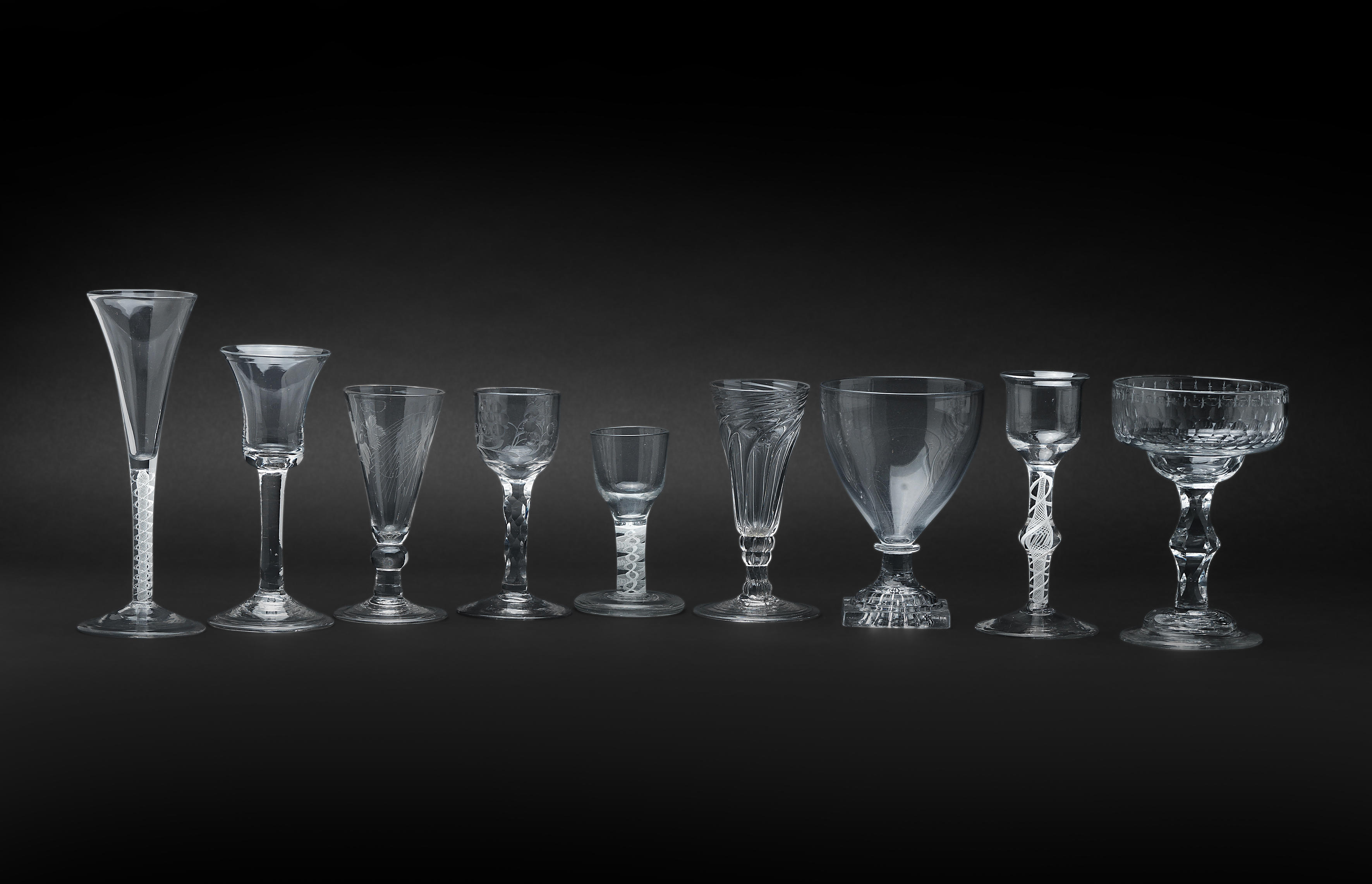 Appraisal: A COLLECTION OF GLASSES th th century Including mixed twist