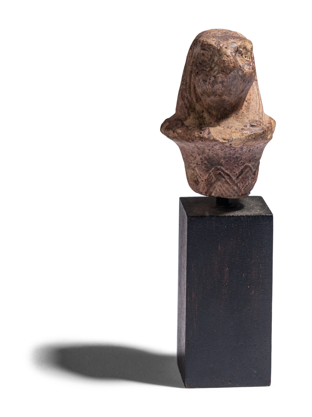 Appraisal: An Egyptian Stone Wadj Fragment with the Head of a