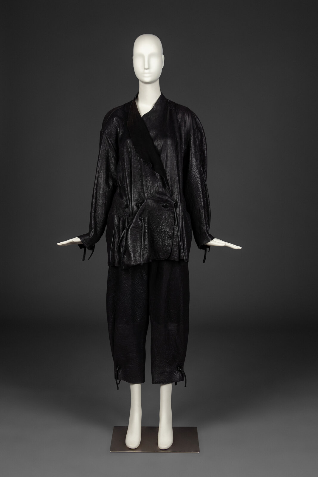 Appraisal: Issey Miyake Black Leather Ensemble s Alicia Simeran was born